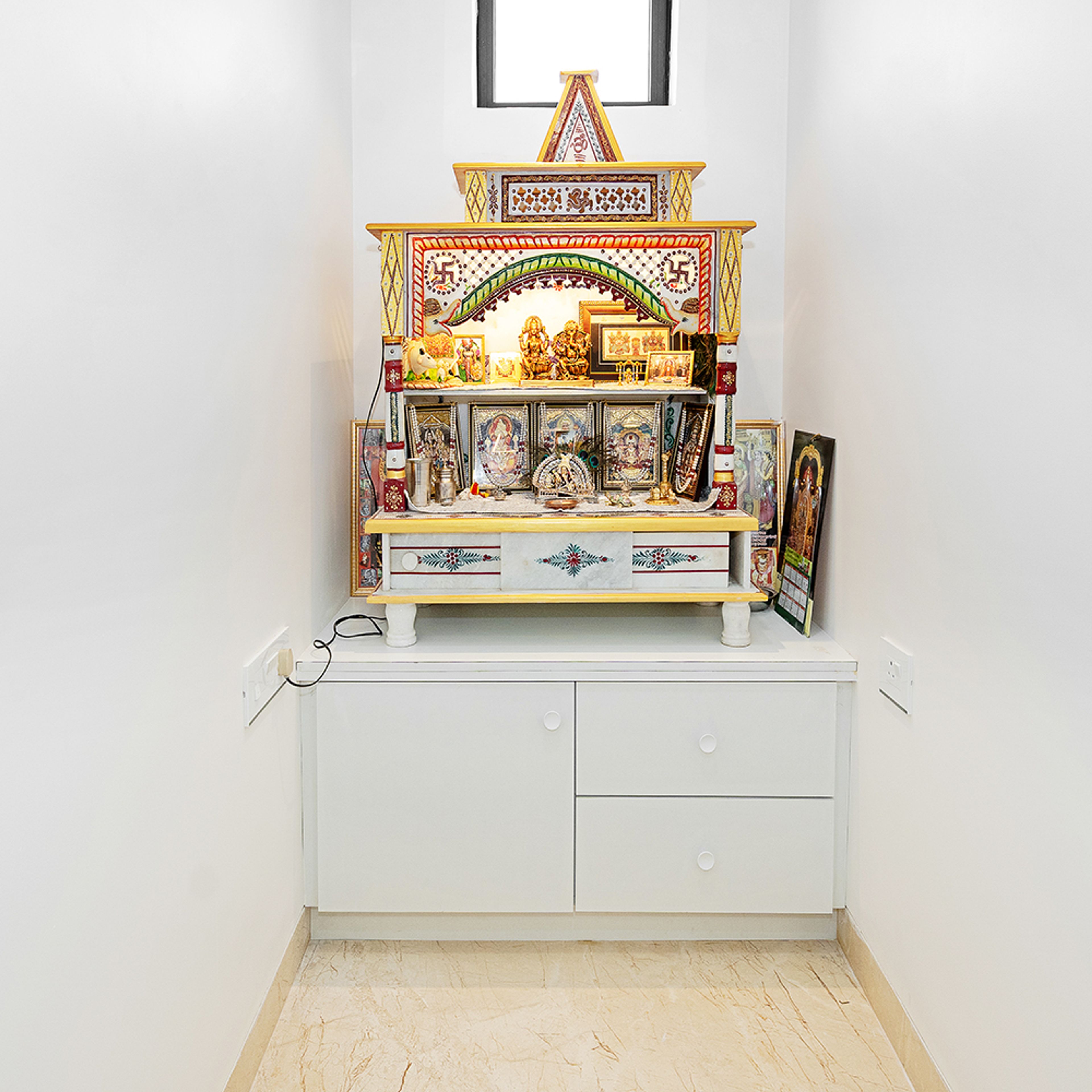 Pooja Unit Design with White Drawers