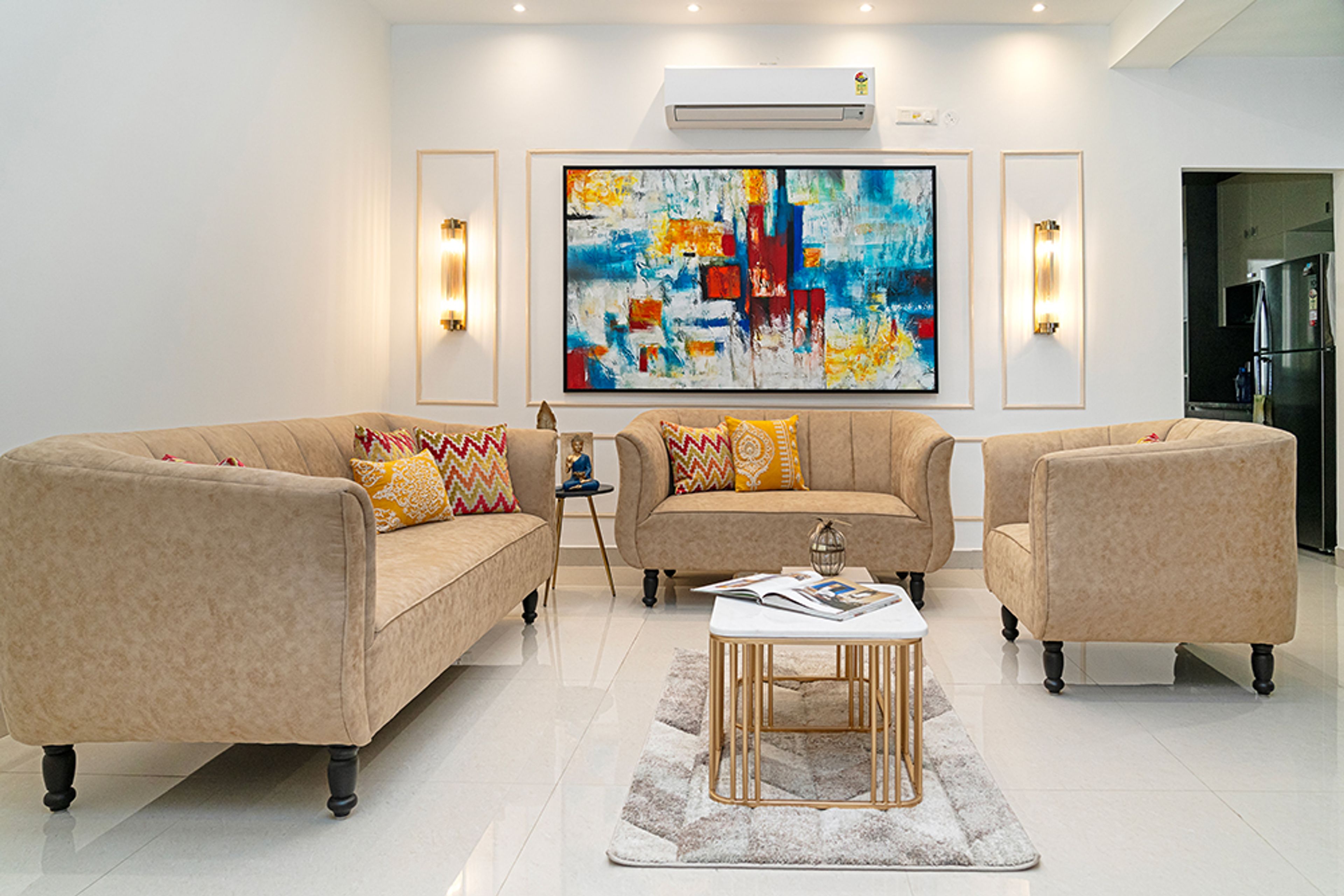 Living Room Design with Light Brown Textured Sofas and Abstract Painting