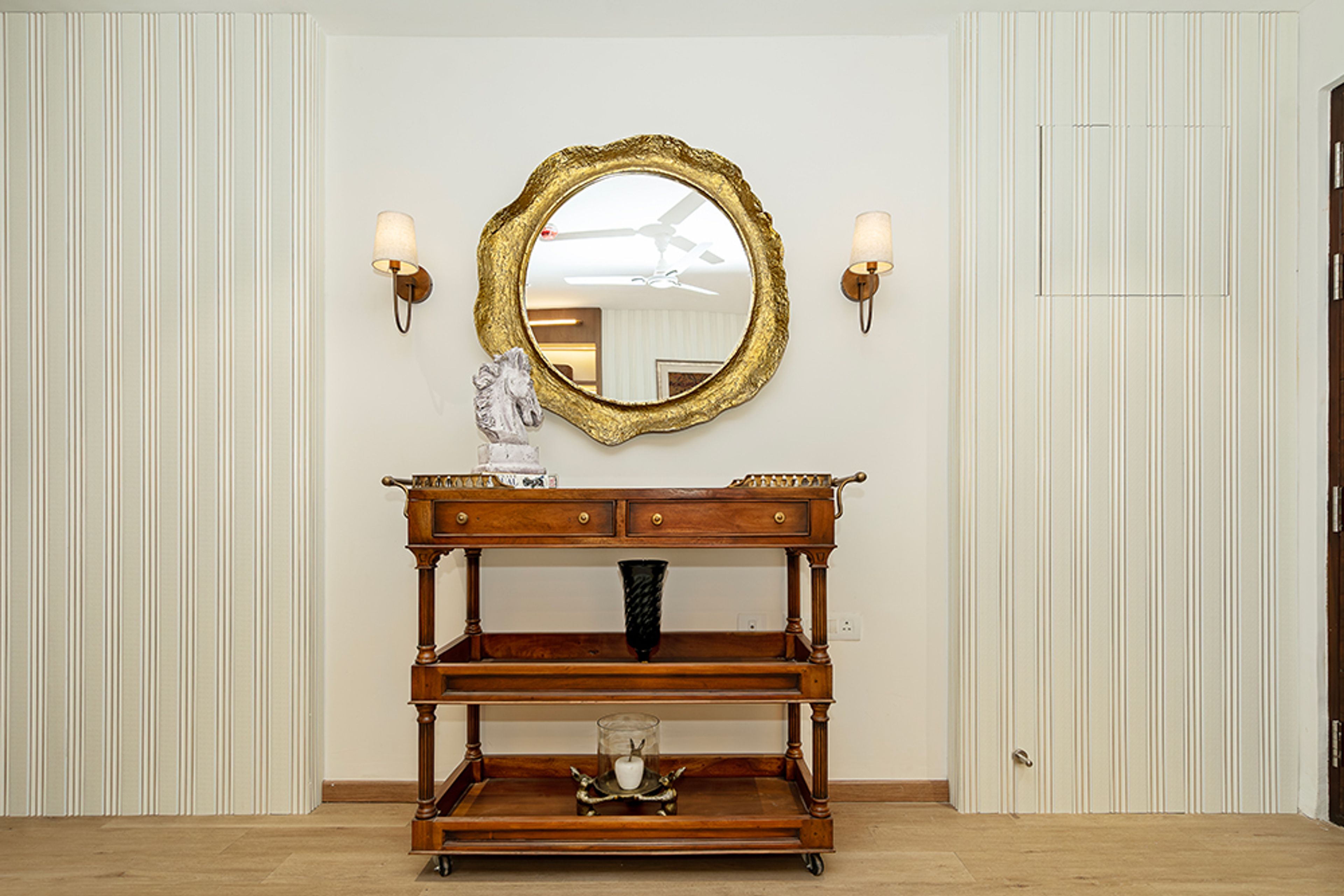 Vanity with Golden Framed Round Mirror and Wooden Open Storage Unit