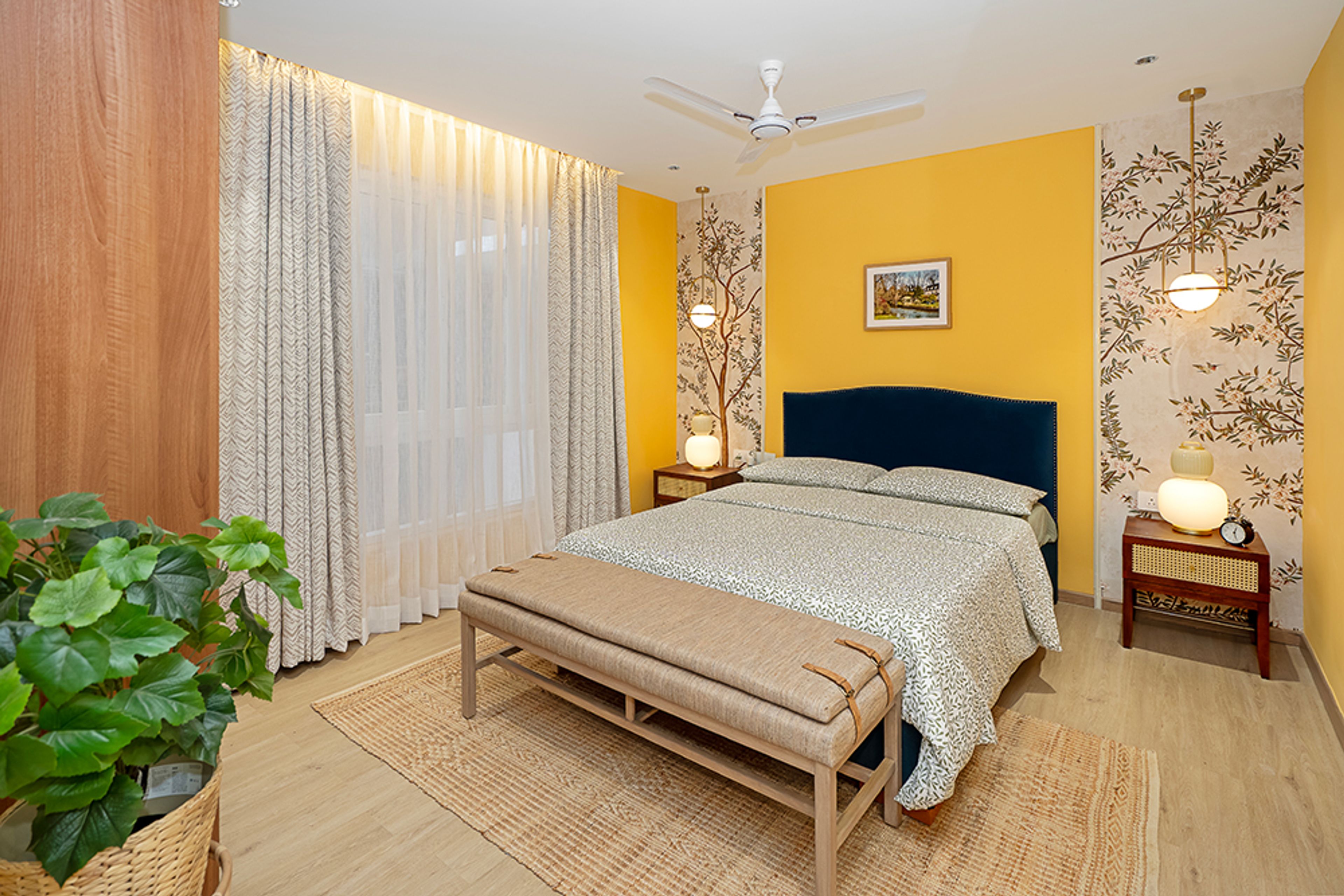 Bedroom Design with Yellow Wall and Tree Themed Wallpaper