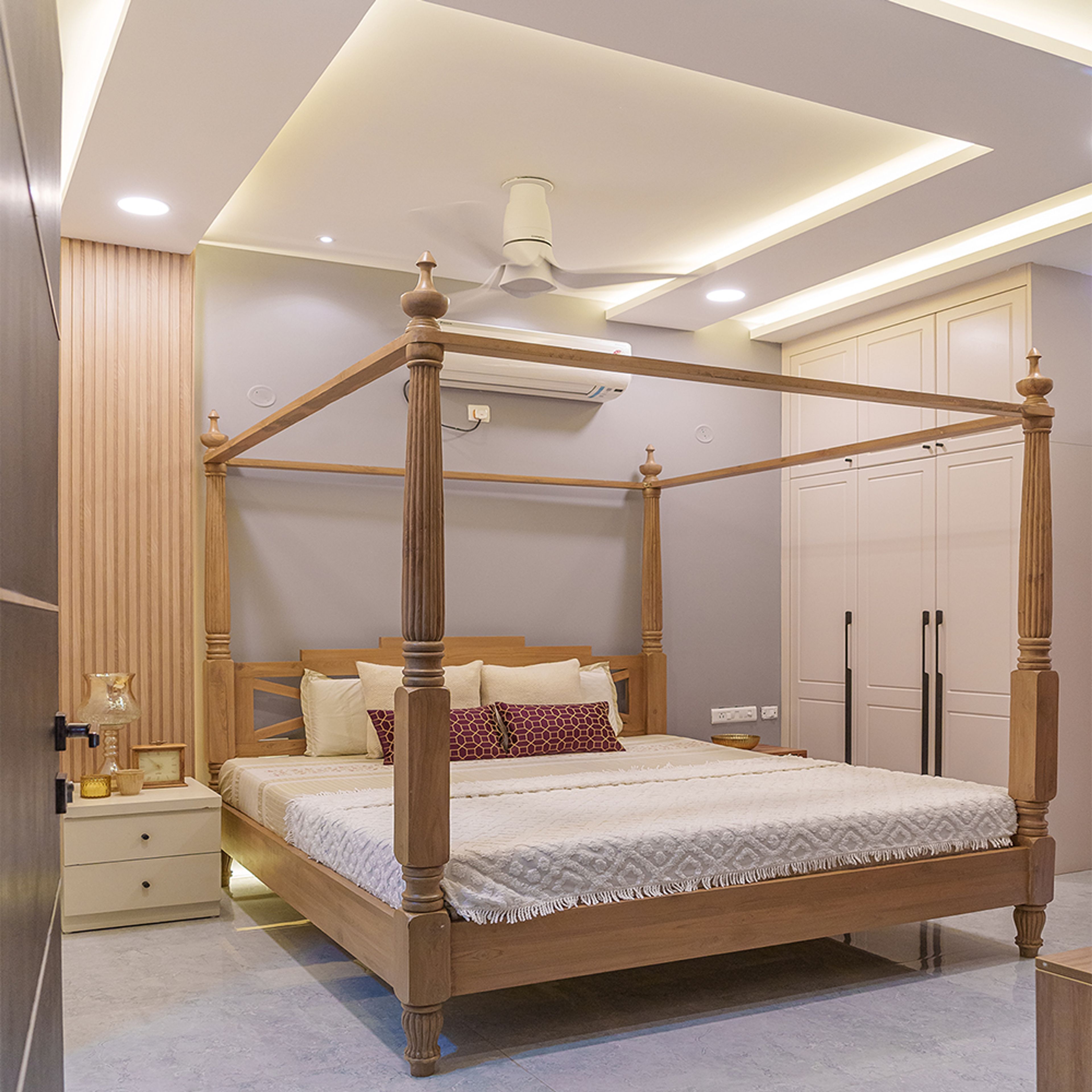 Bedroom Design with Grey Walls and Wooden Four Poster Bed