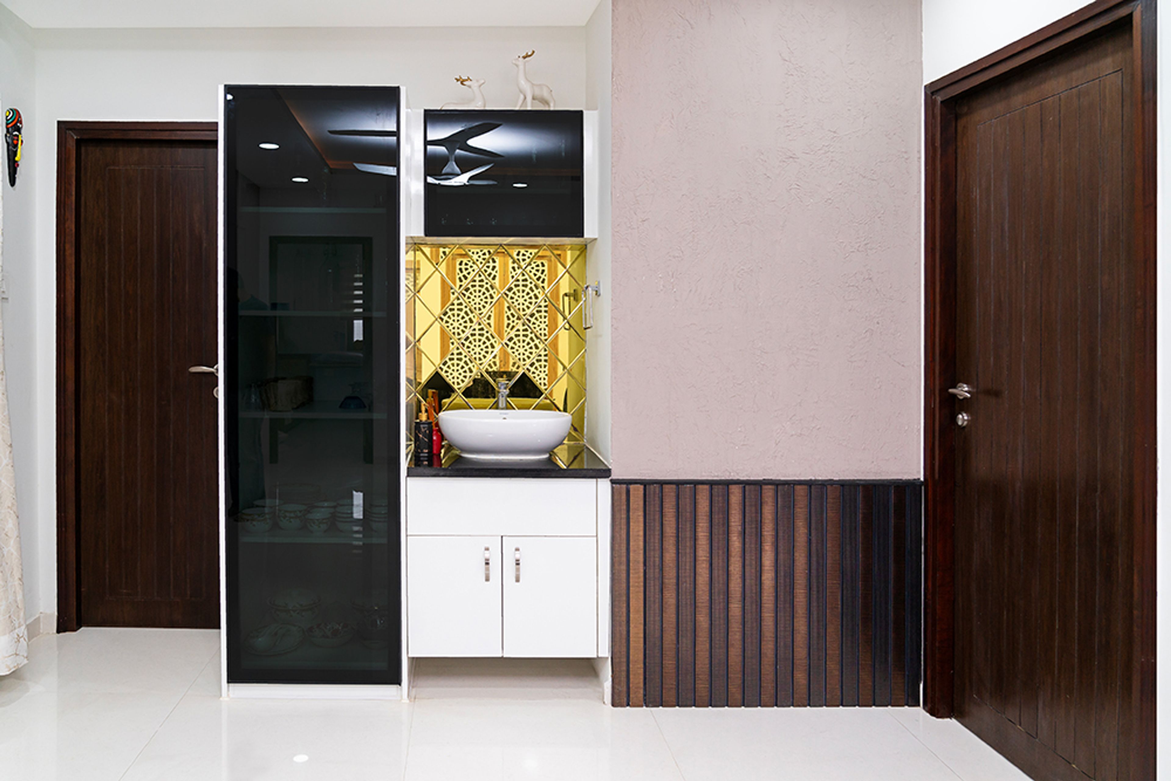 Crockery Unit Design with Black Tinted Glass Shutter Tall Unit and Wash Area