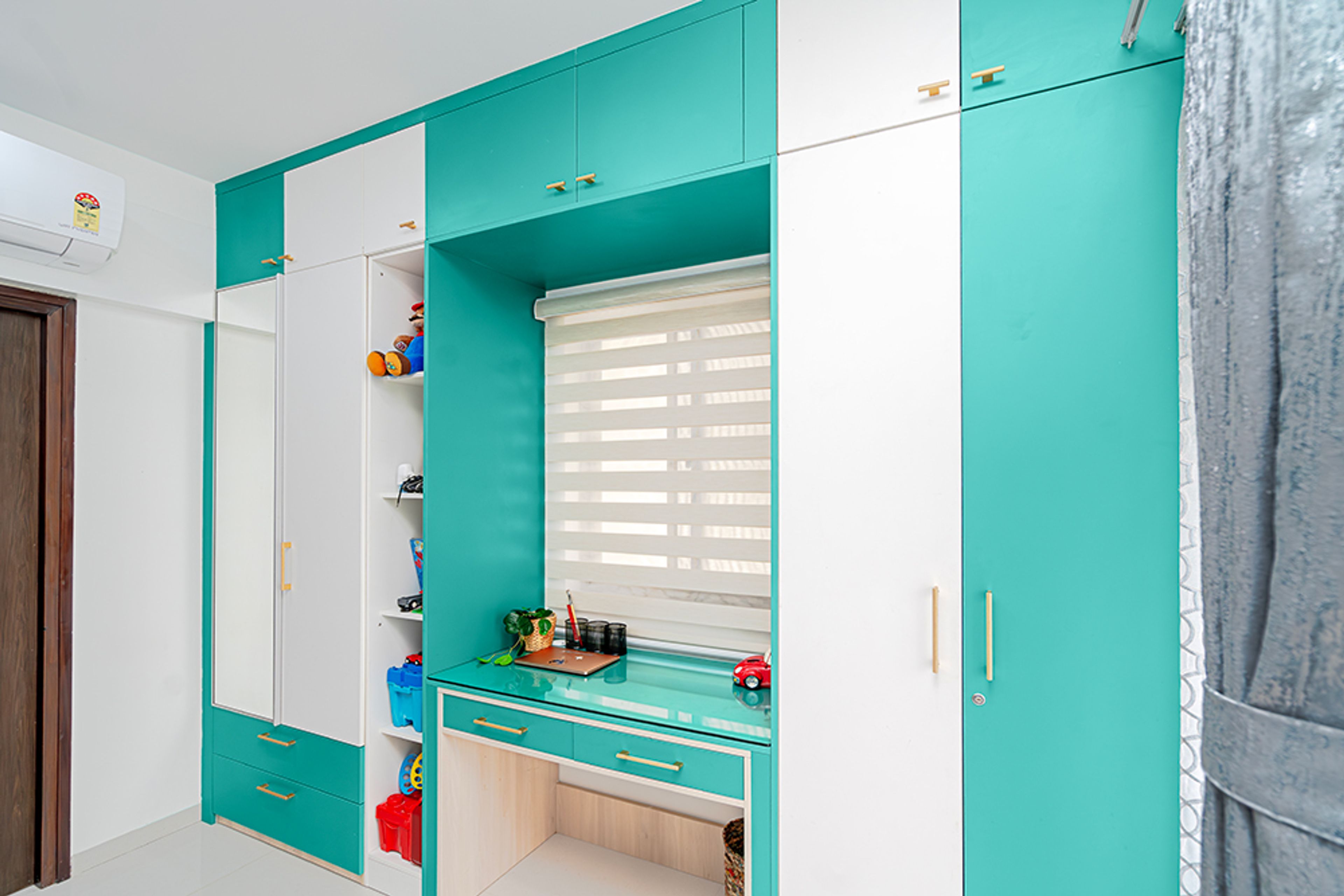 4-Door Green and White Swing Wardrobe with Integrated Mirror and Attached Study Space