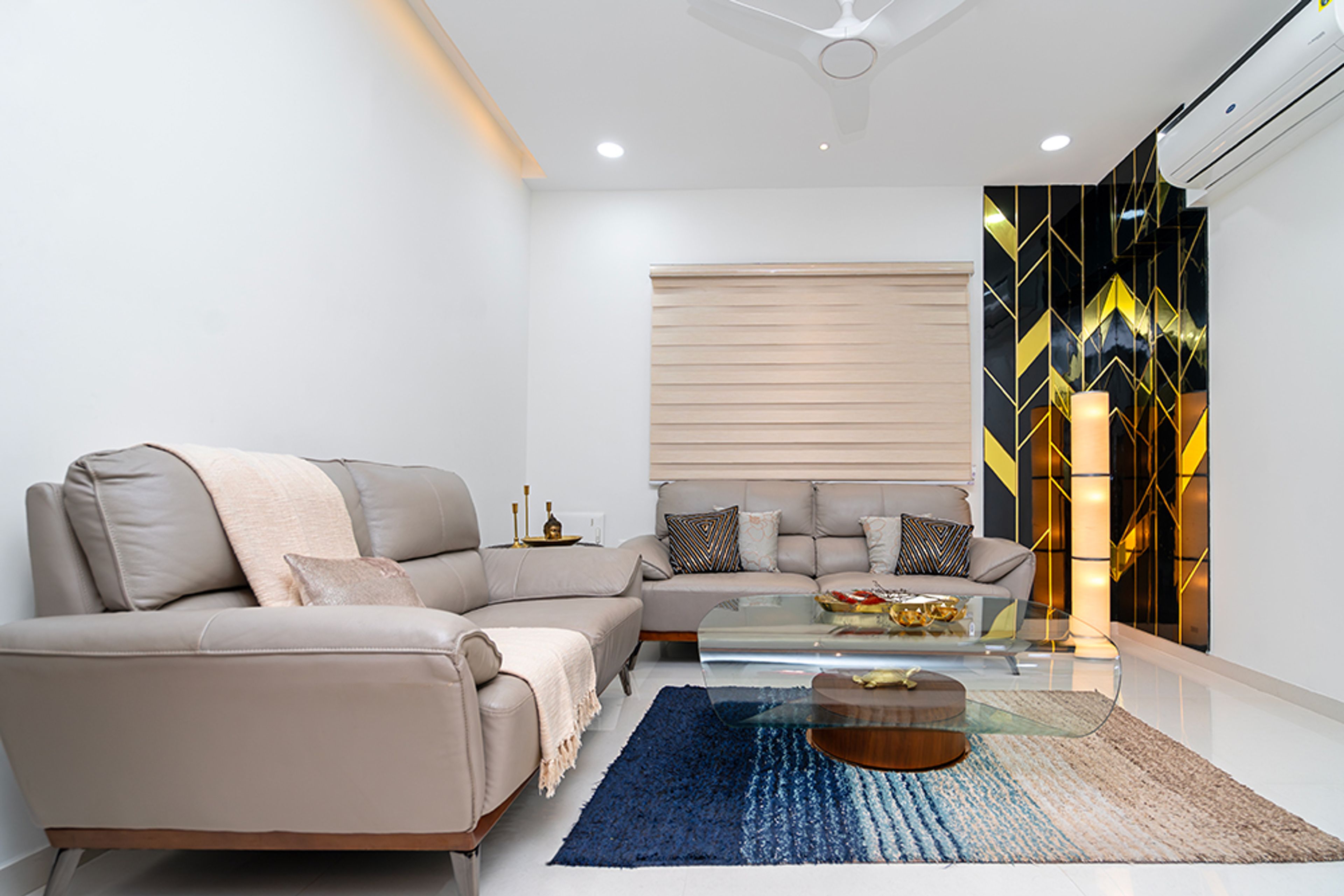 Living Room Design with Two Grey Leather Sofas and Glass Table