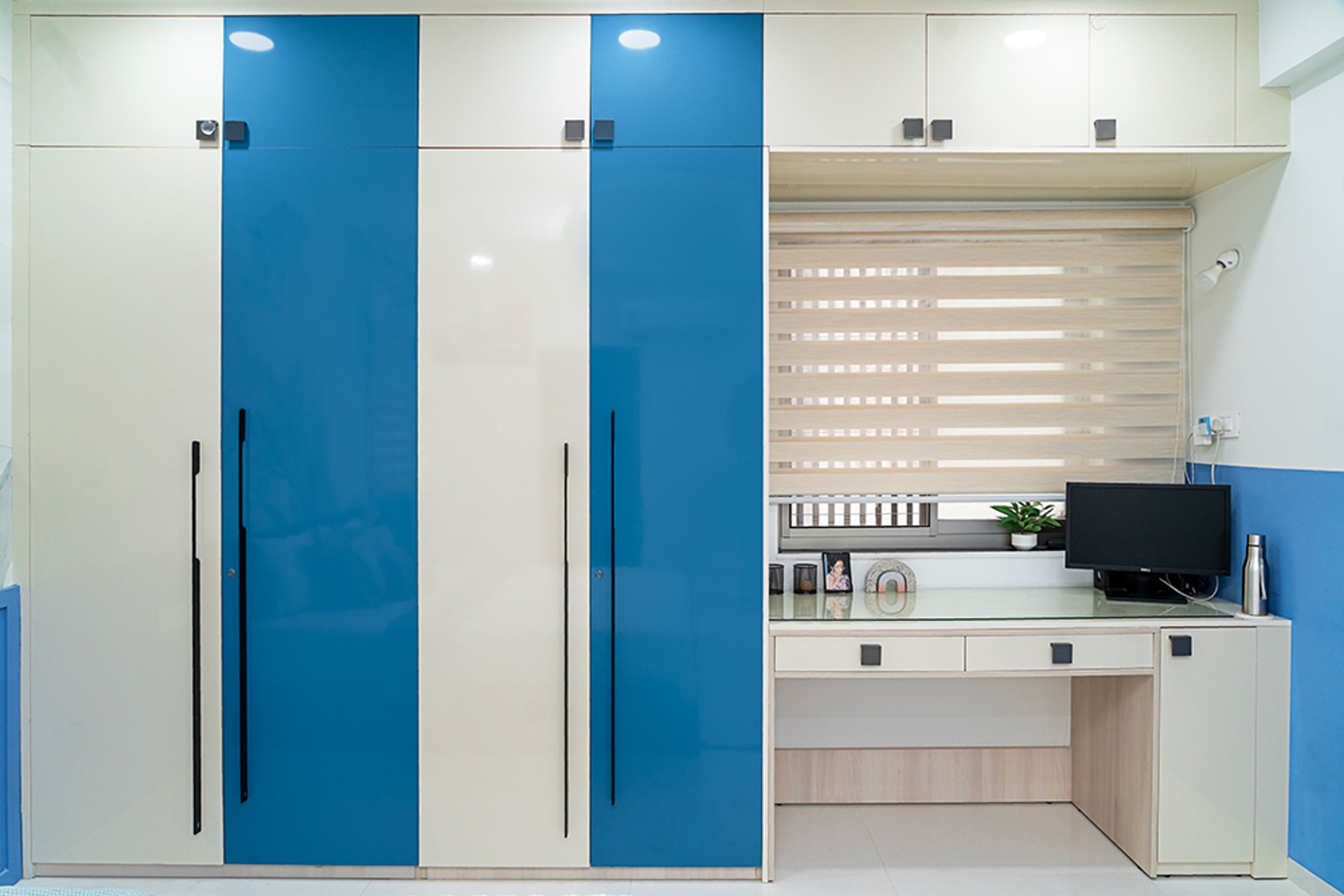 Blue and Cream 4-Door Swing Wardrobe and Cream Study Space