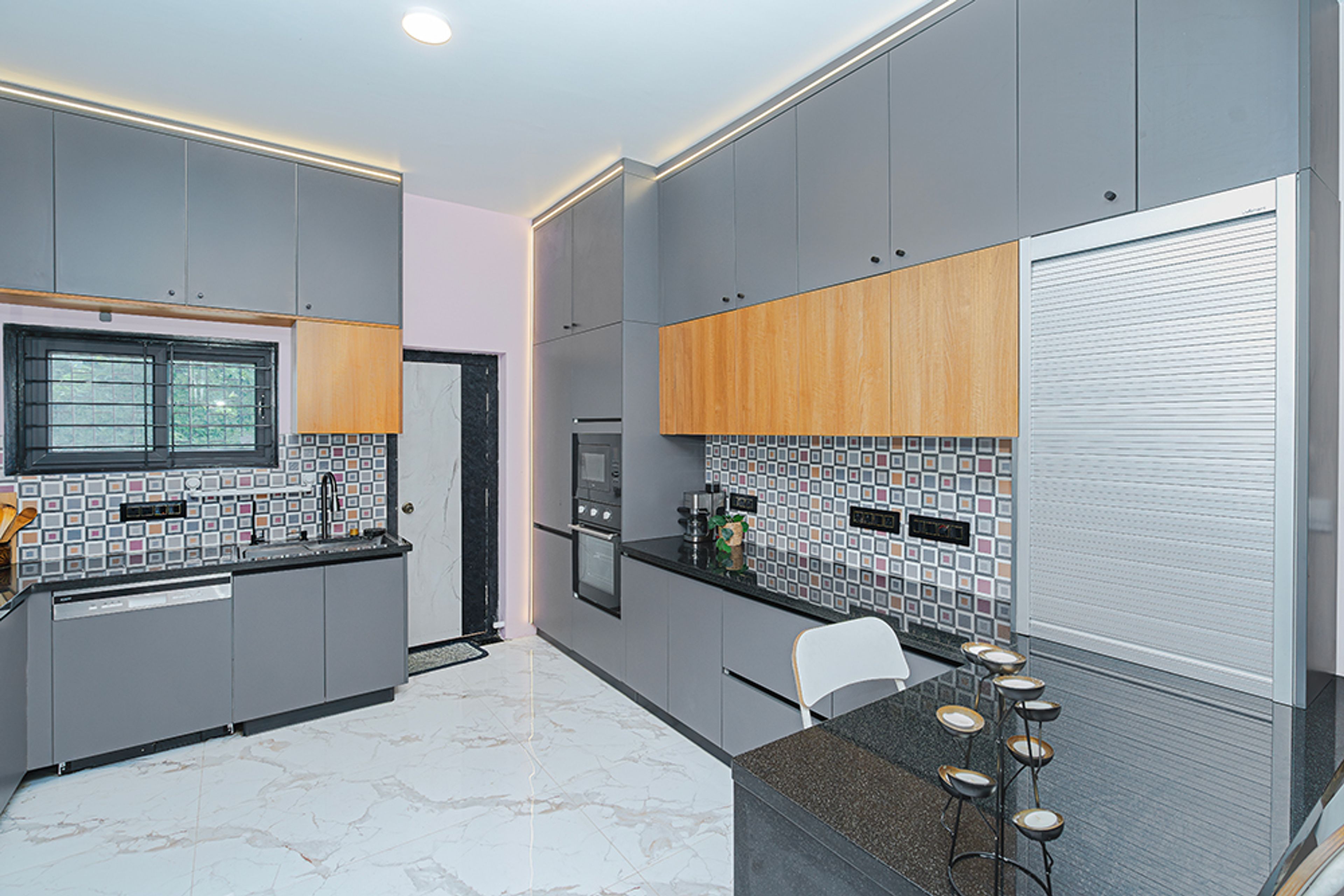 U-Shaped Kitchen Design with Grey and Natural Wood Units and Patterned Backsplash Tiles