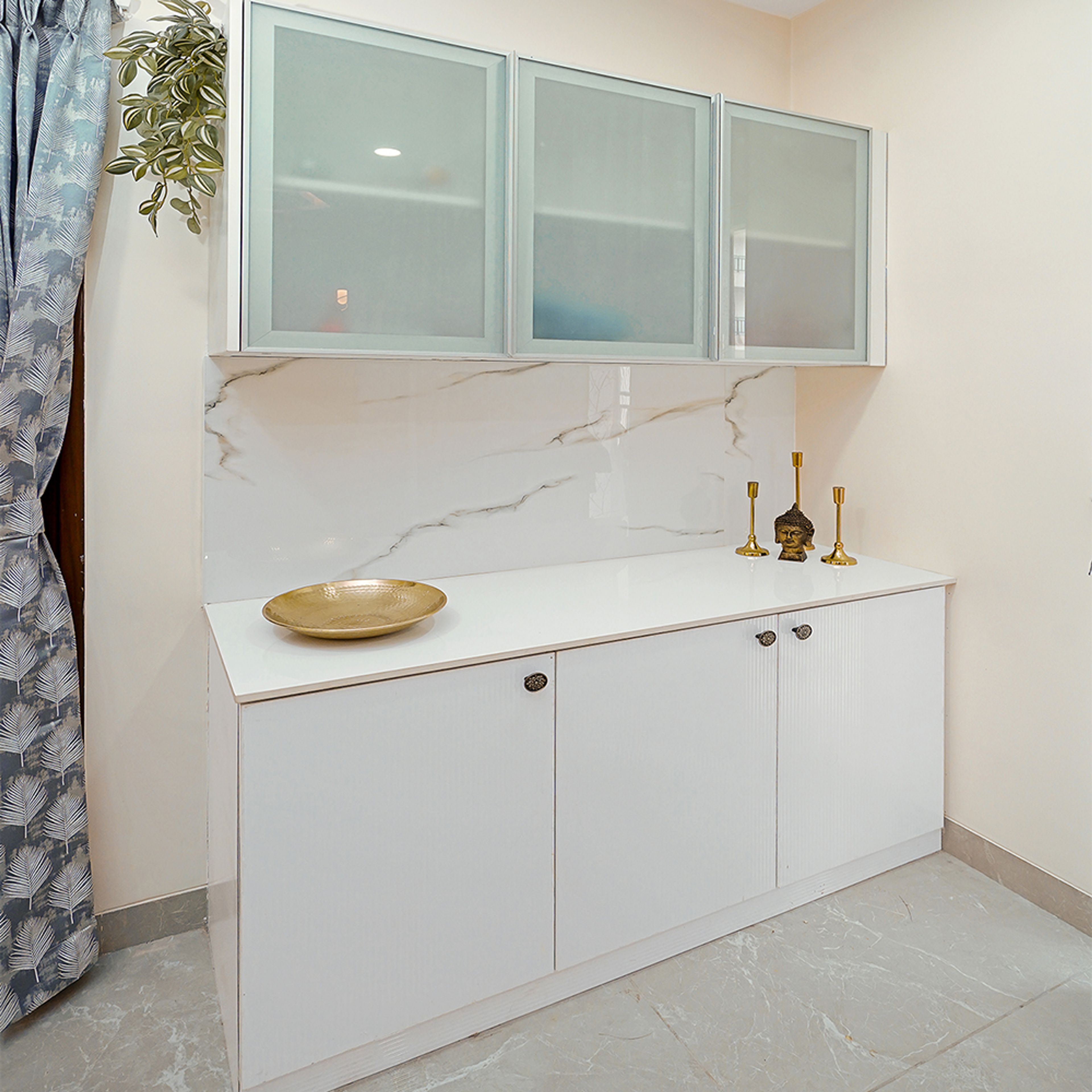 Crockery Unit Design with White and Frosted Glass Shutter Cabinets