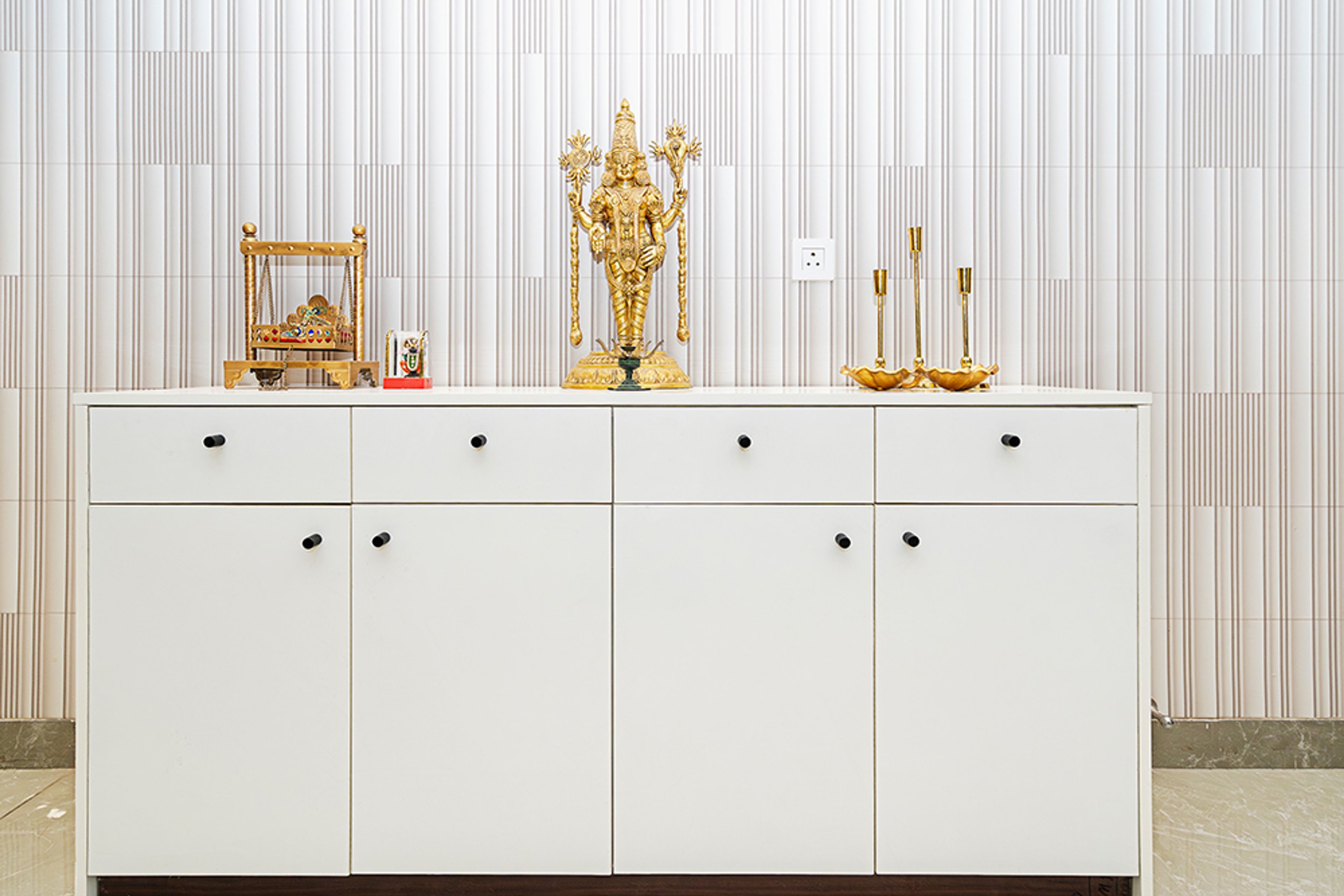 Modern Pooja Design with White Drawers in Hyderabad 3BHK Apartment