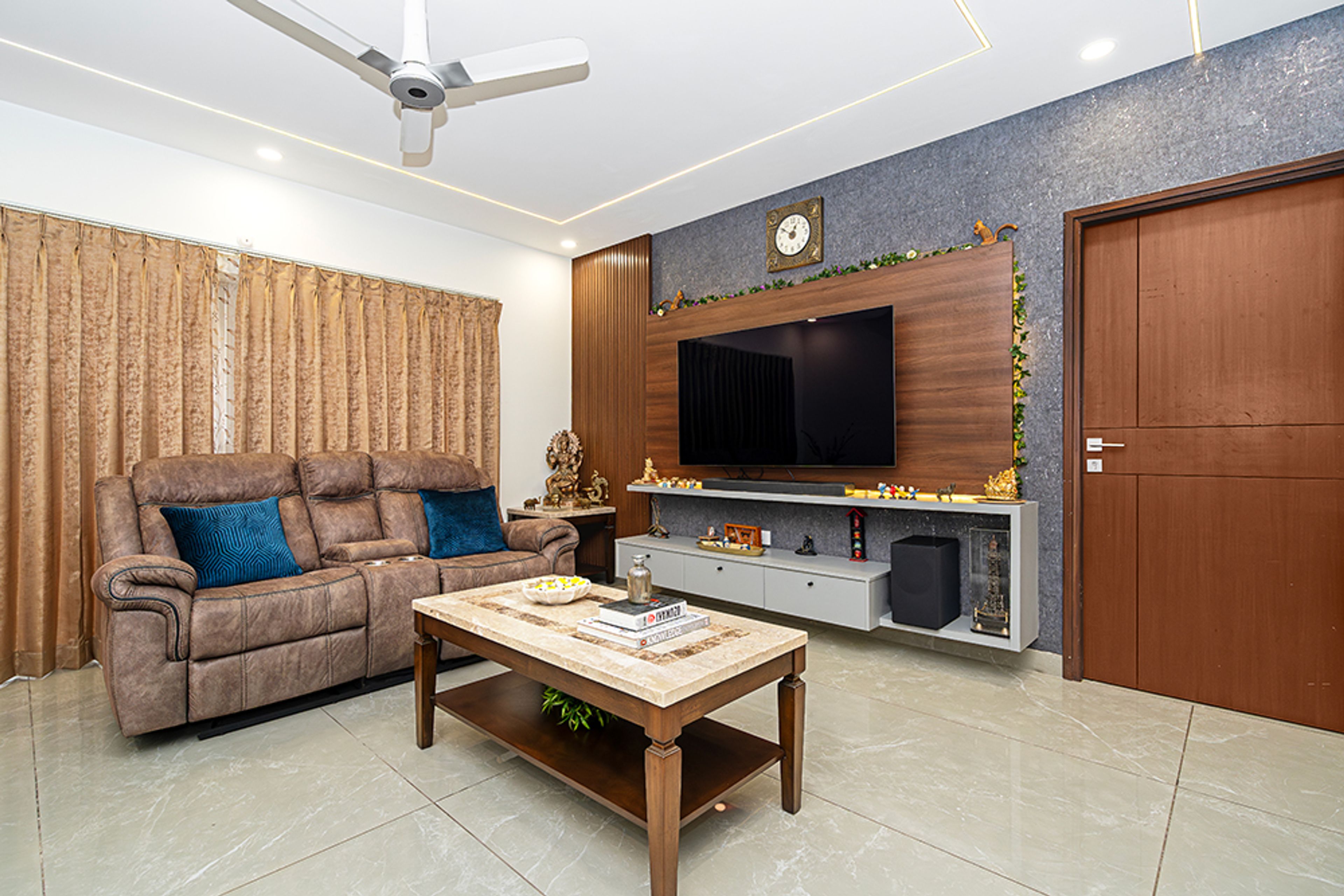 Modern Living Room Design with TV Unit in Hyderabad 3BHK Apartment