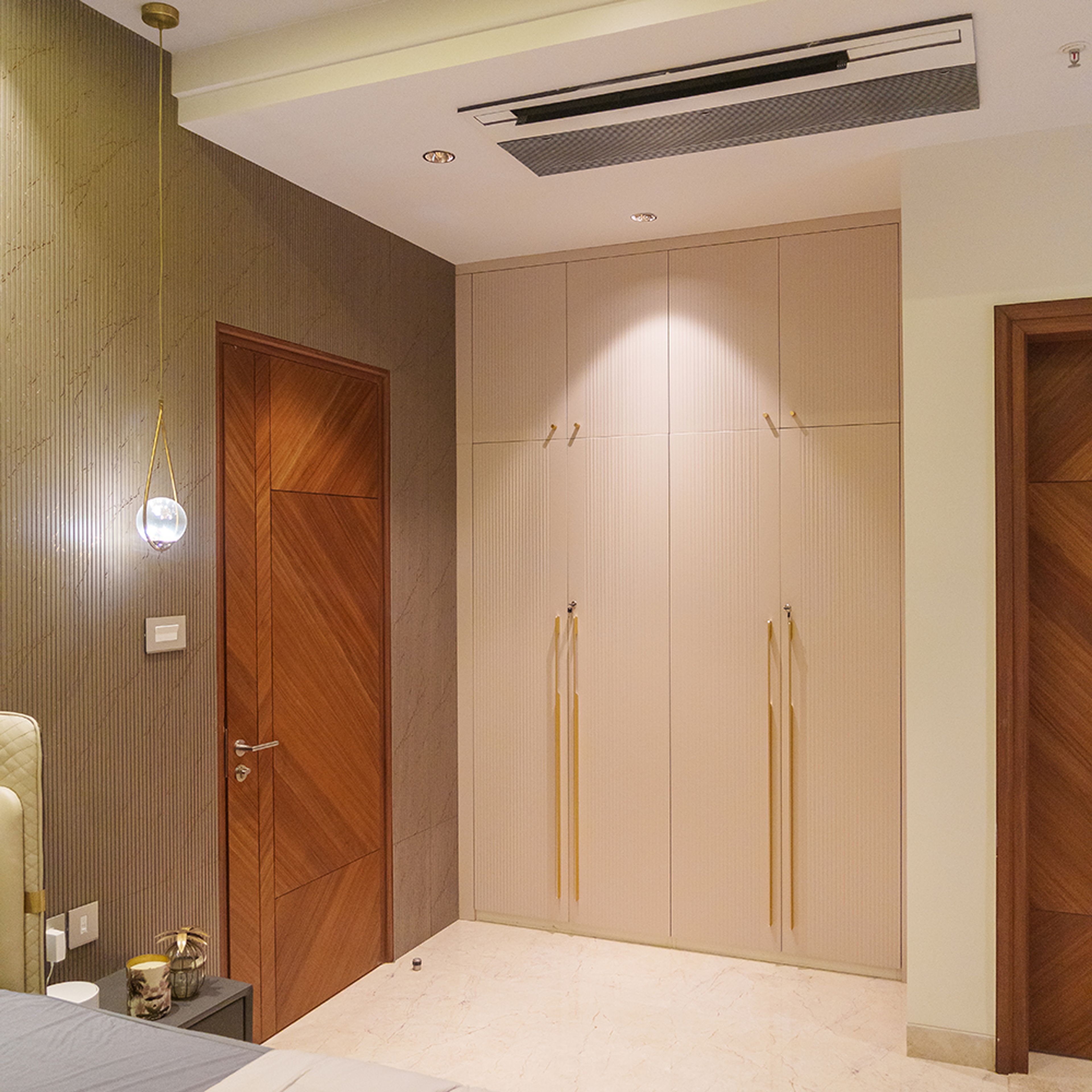 4-Door Light Pink Swing Wardrobe Design