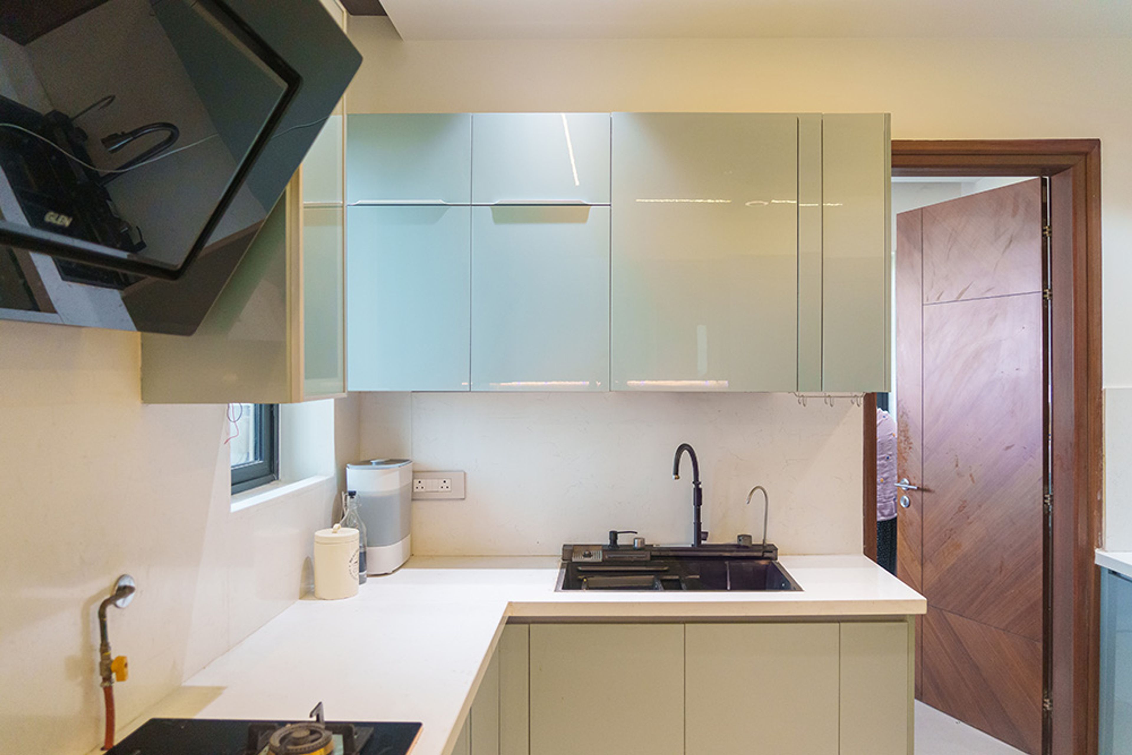U-Shaped Kitchen Design with Light Blue Cabinets