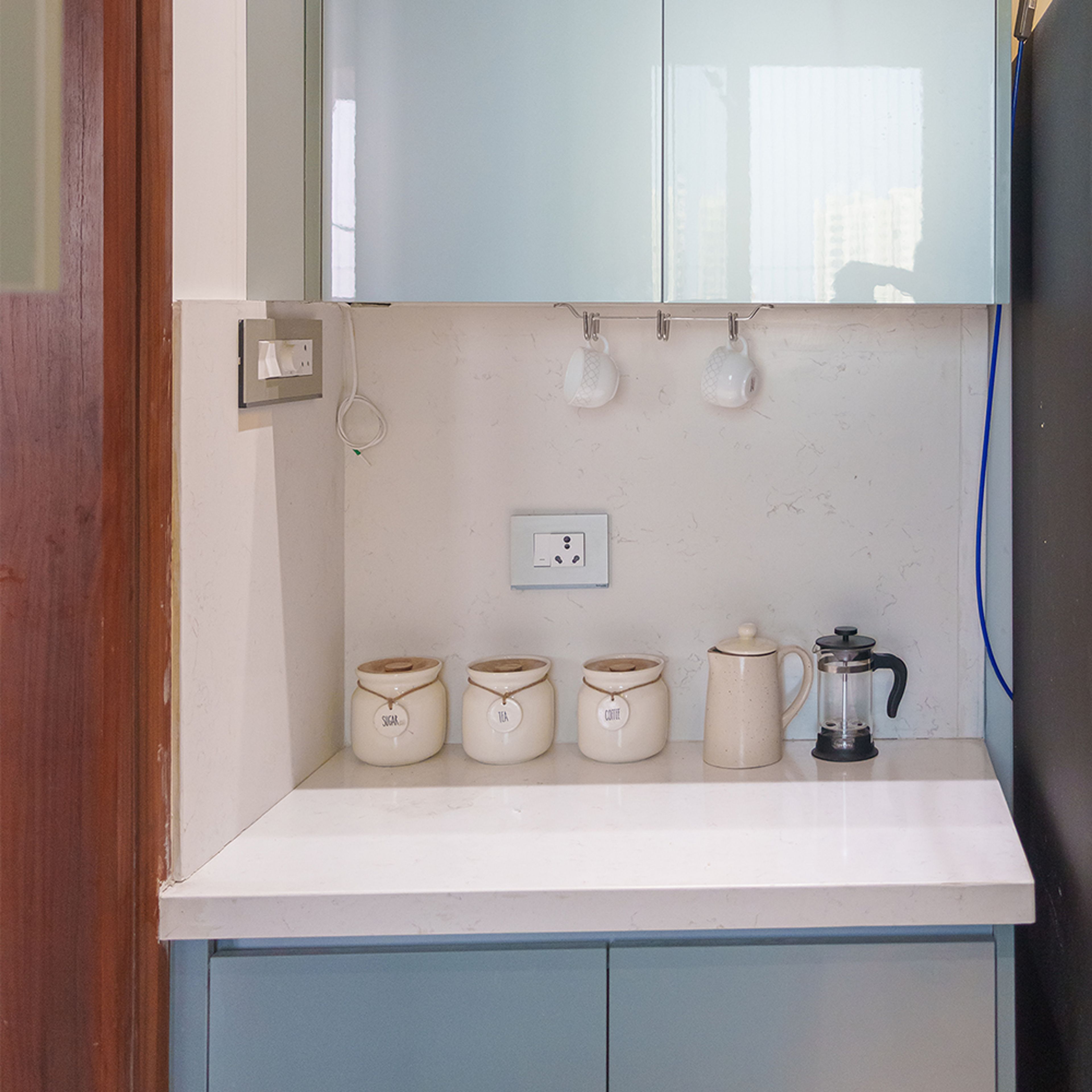 U-Shaped Kitchen Design with Light Blue Cabinets