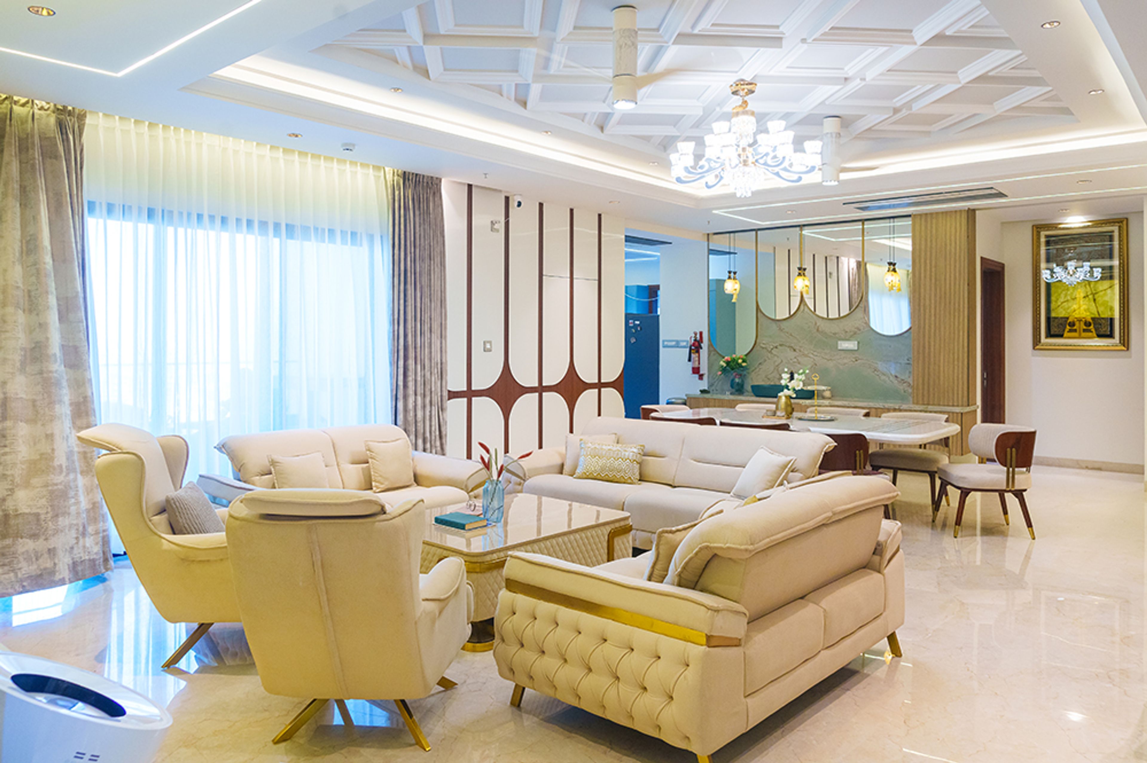 Living and Dining Room Design with Cream Upholstered Sofas, Marble Dining Table and 8 Beige Chairs