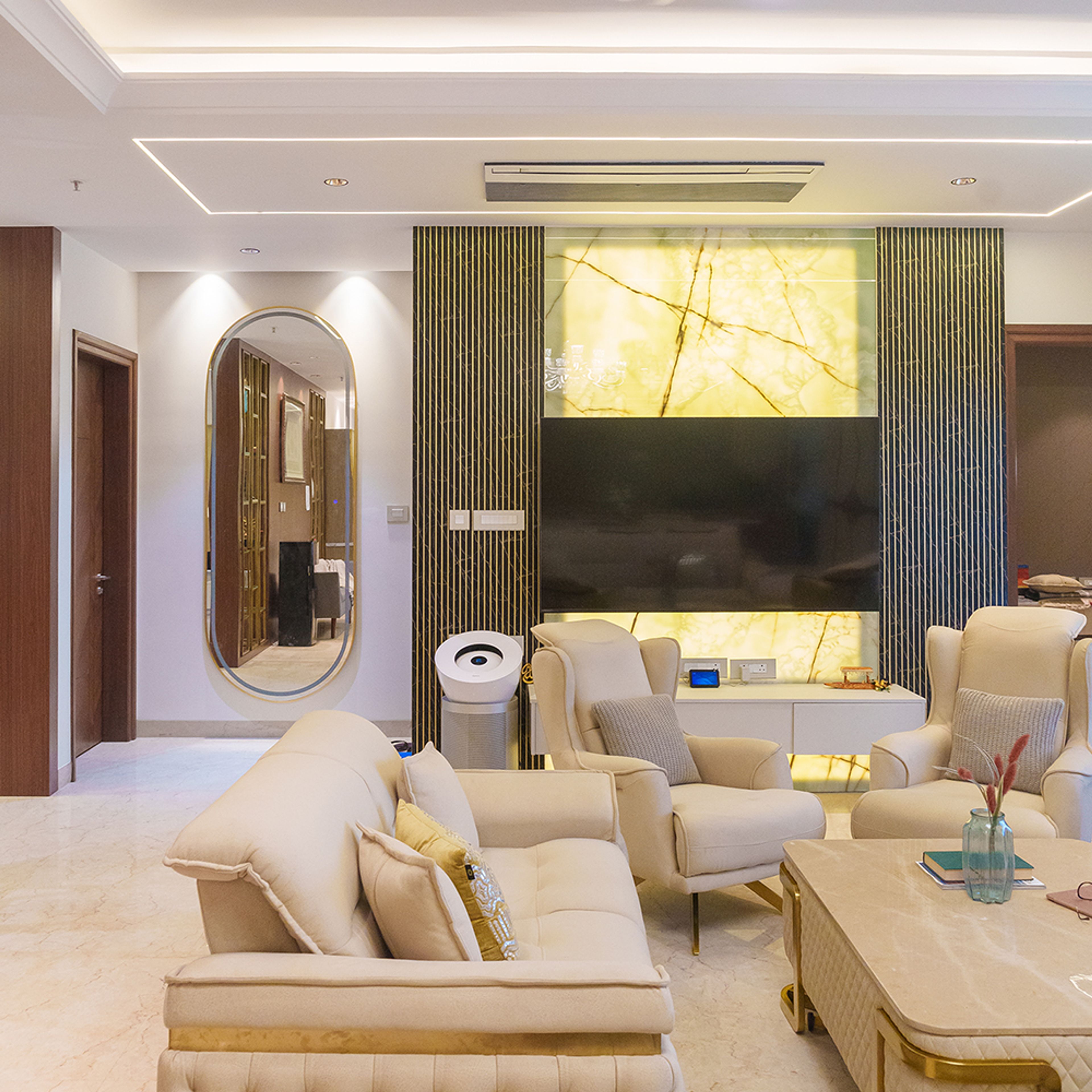 Living Room Design with Off-White Sofas and TV Unit with Green Fluted Walls