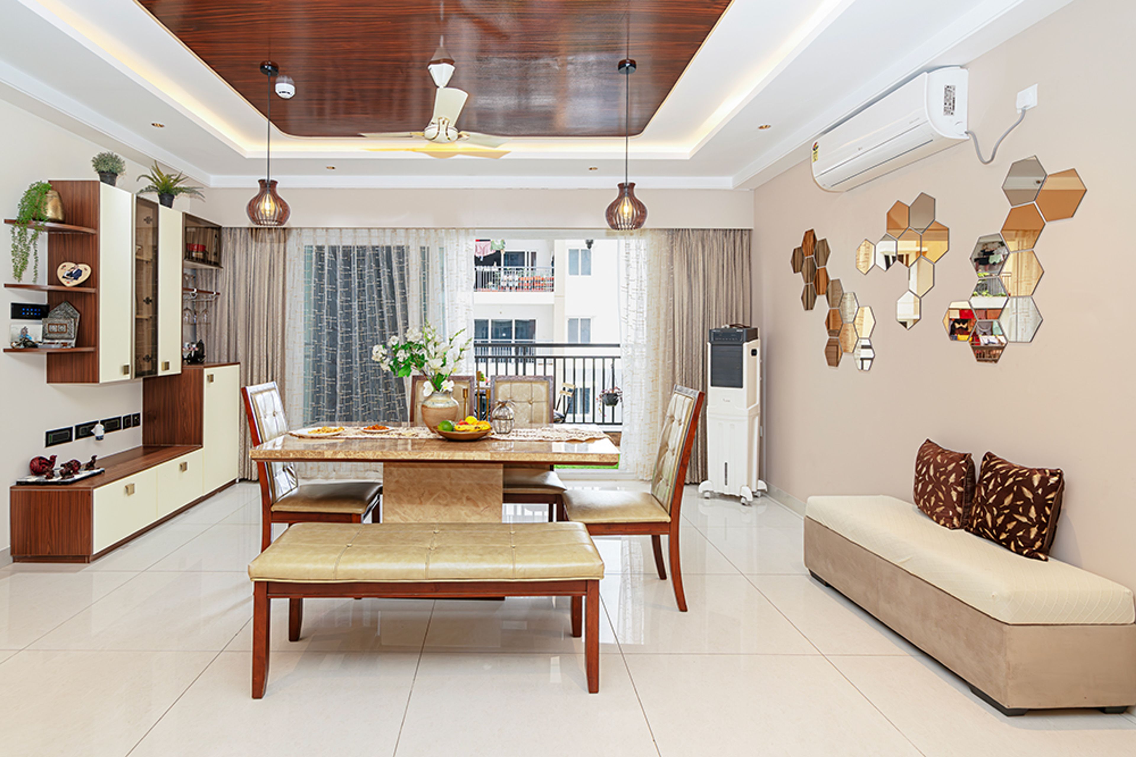 Dining Room Design with 4 Chairs, Cushioned Bench, and Cream and Wooden Crockery Unit