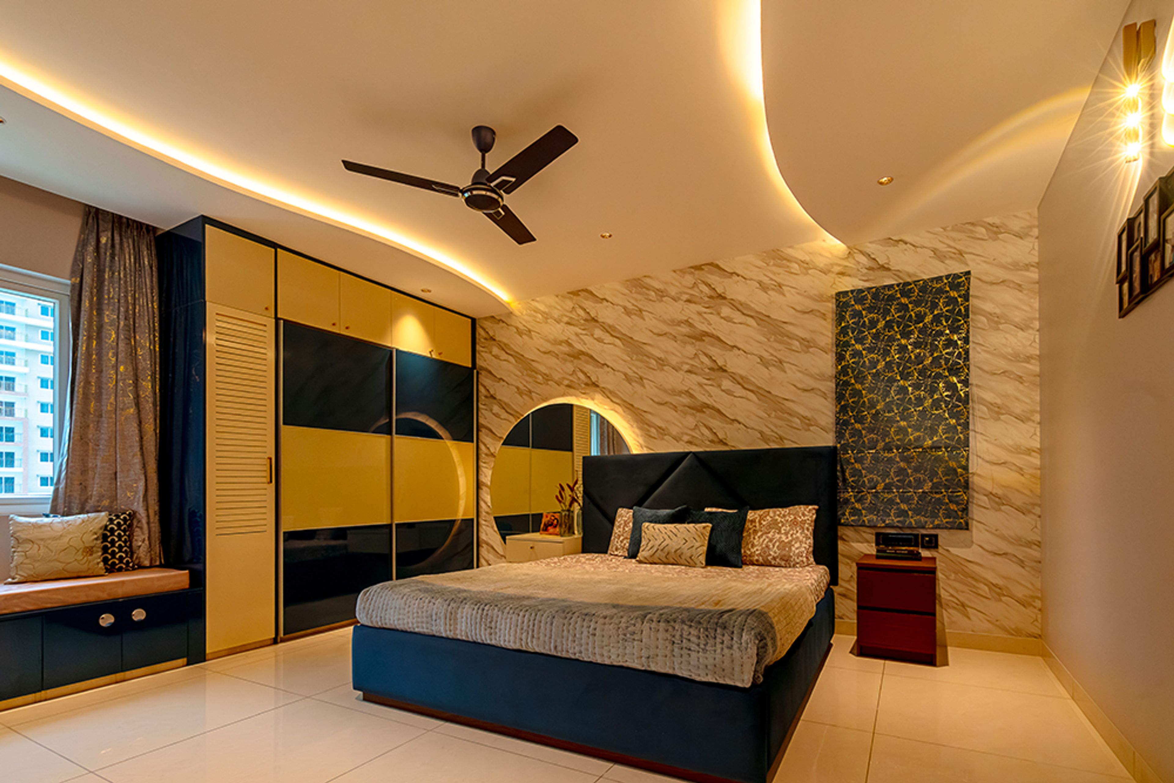 Bedroom Design with Marble Patterned Wall and 2-Door Blue and Mirror Integrated Sliding Wardrobe