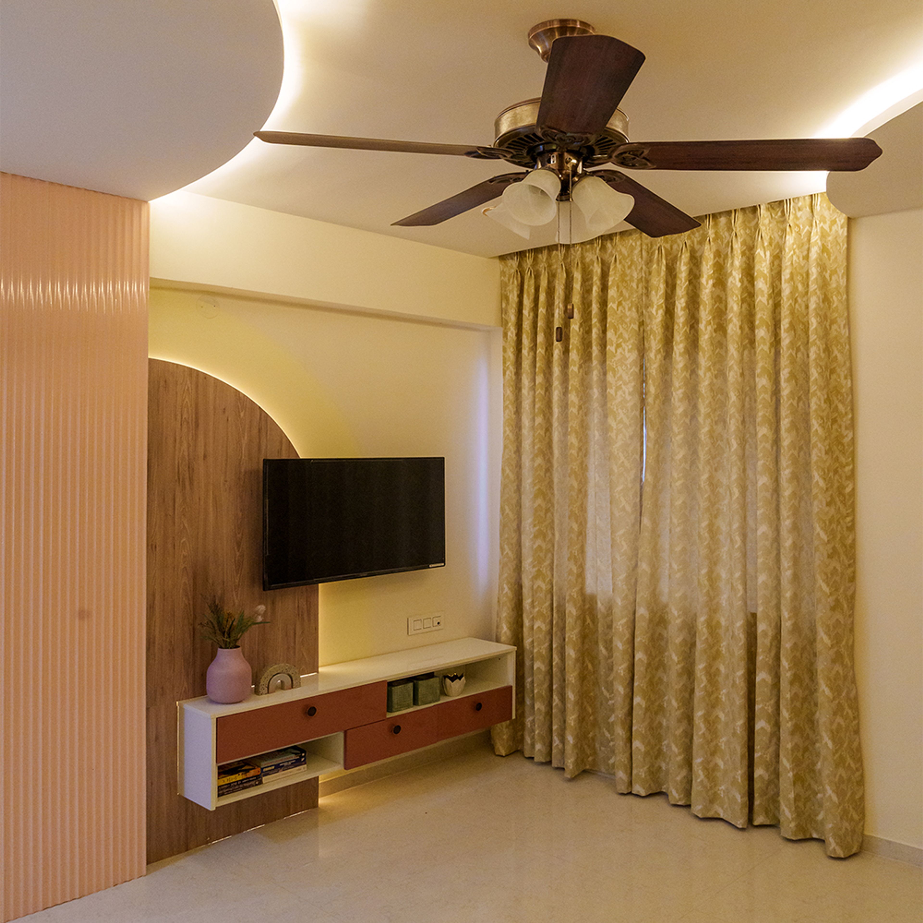 TV Unit Design with Arched Wooden Wall and Pink Fluted Wall