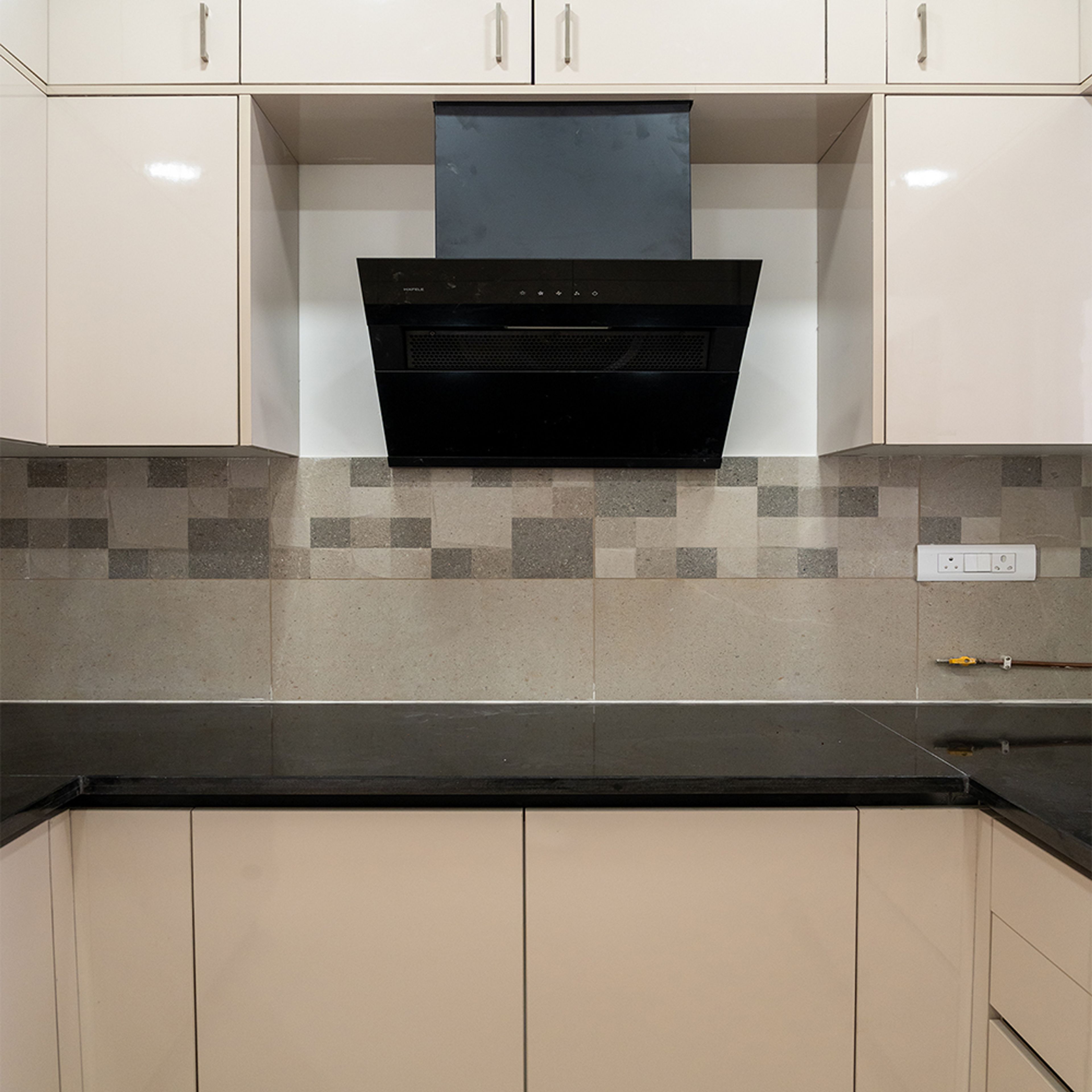 U-Shaped Kitchen Design with Cream Units and Granite Countertop