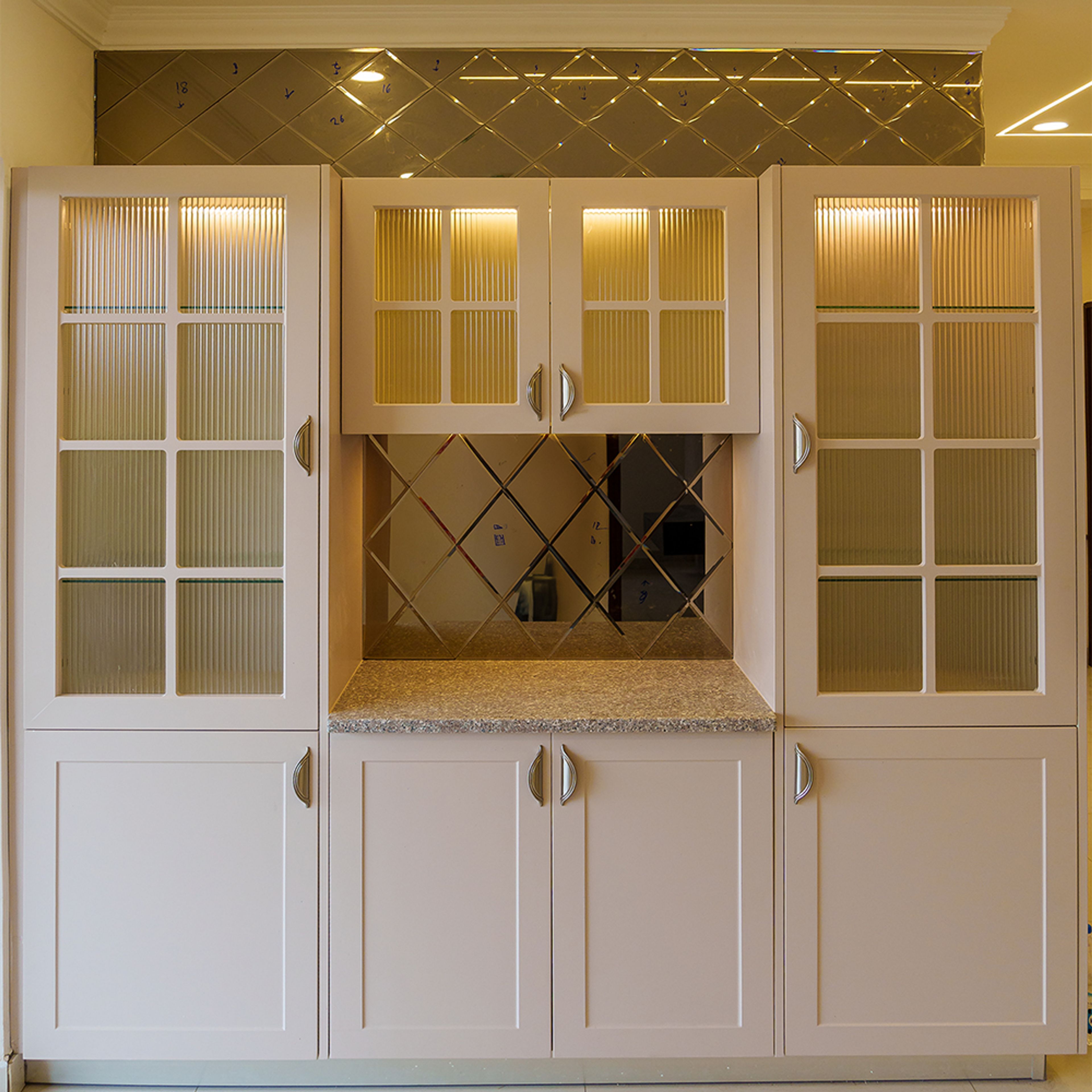 Crockery Unit Design with White Profile and Frosted Glass Shutters