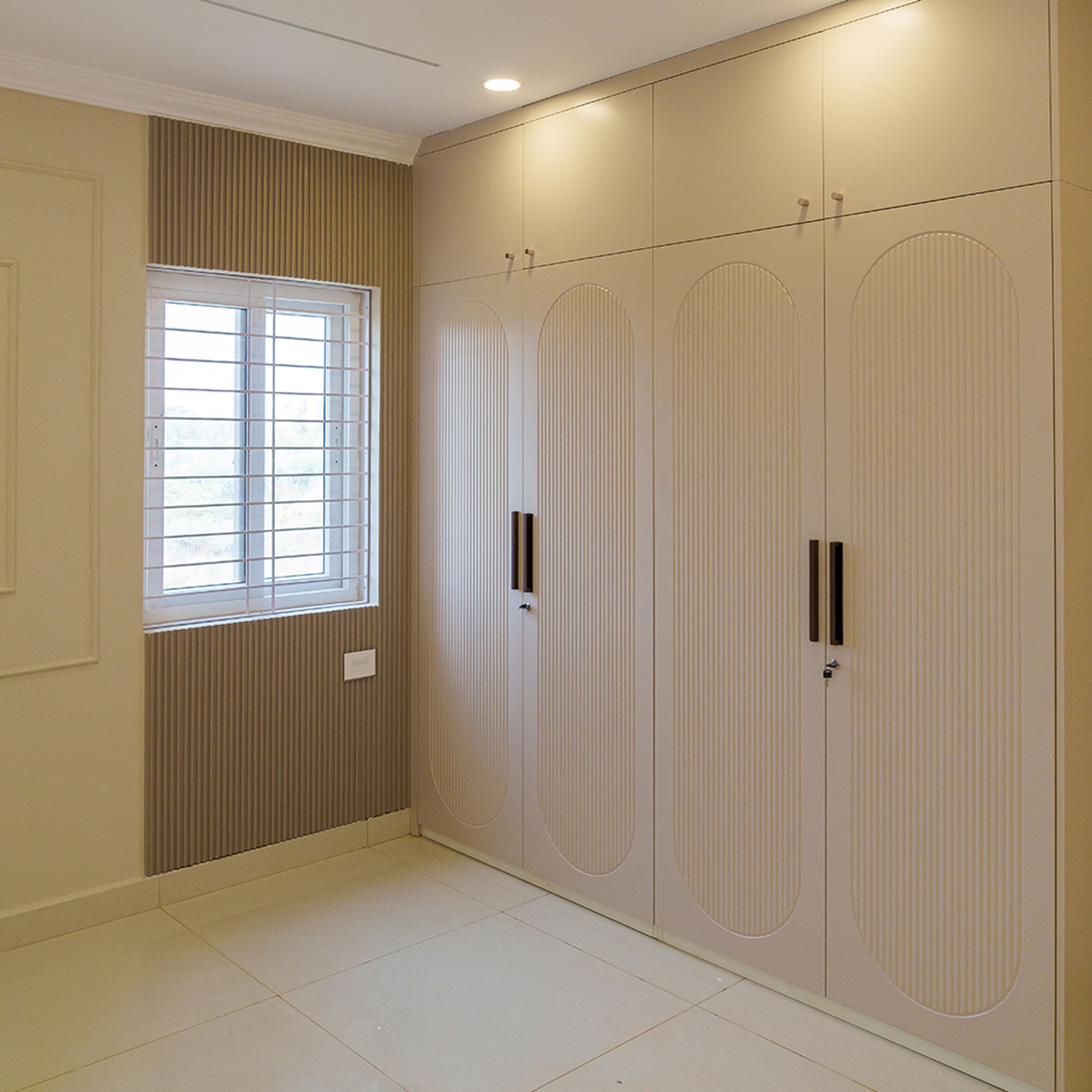 4-Door Beige Swing Wardrobe Design and Fluted Brown Window Wall