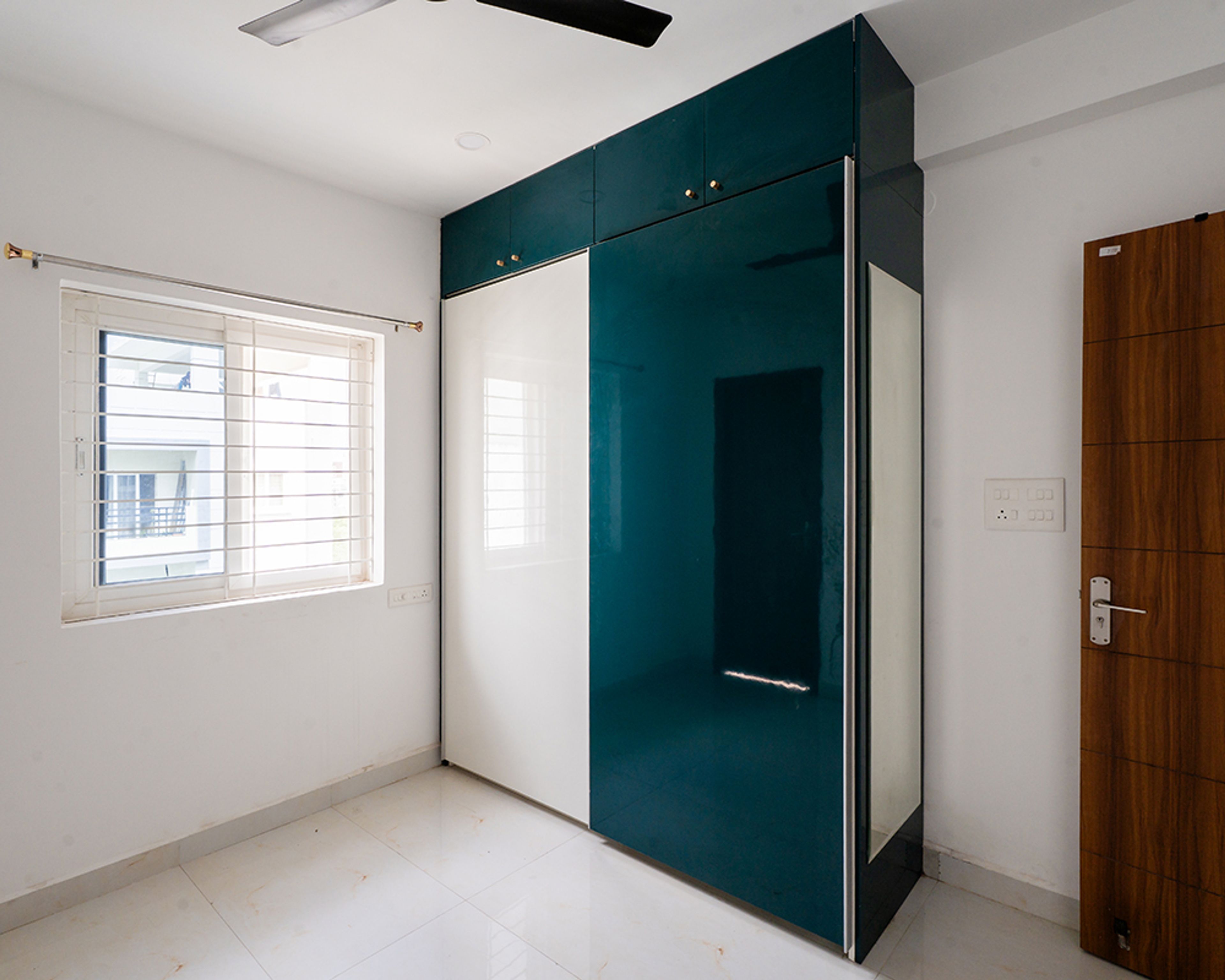 2-Door Dark Green and White Sliding Wardrobe Design with Integrated Mirror