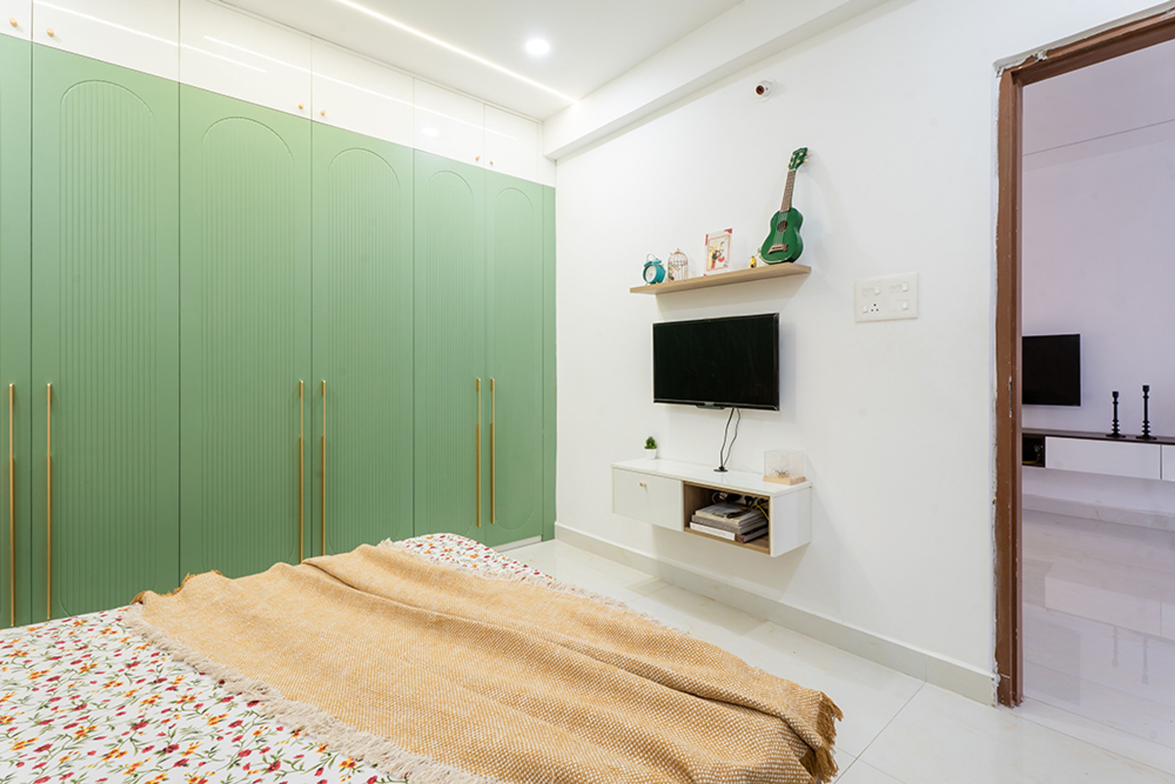 Bedroom Design with 6-Door Green Swing Wardrobe