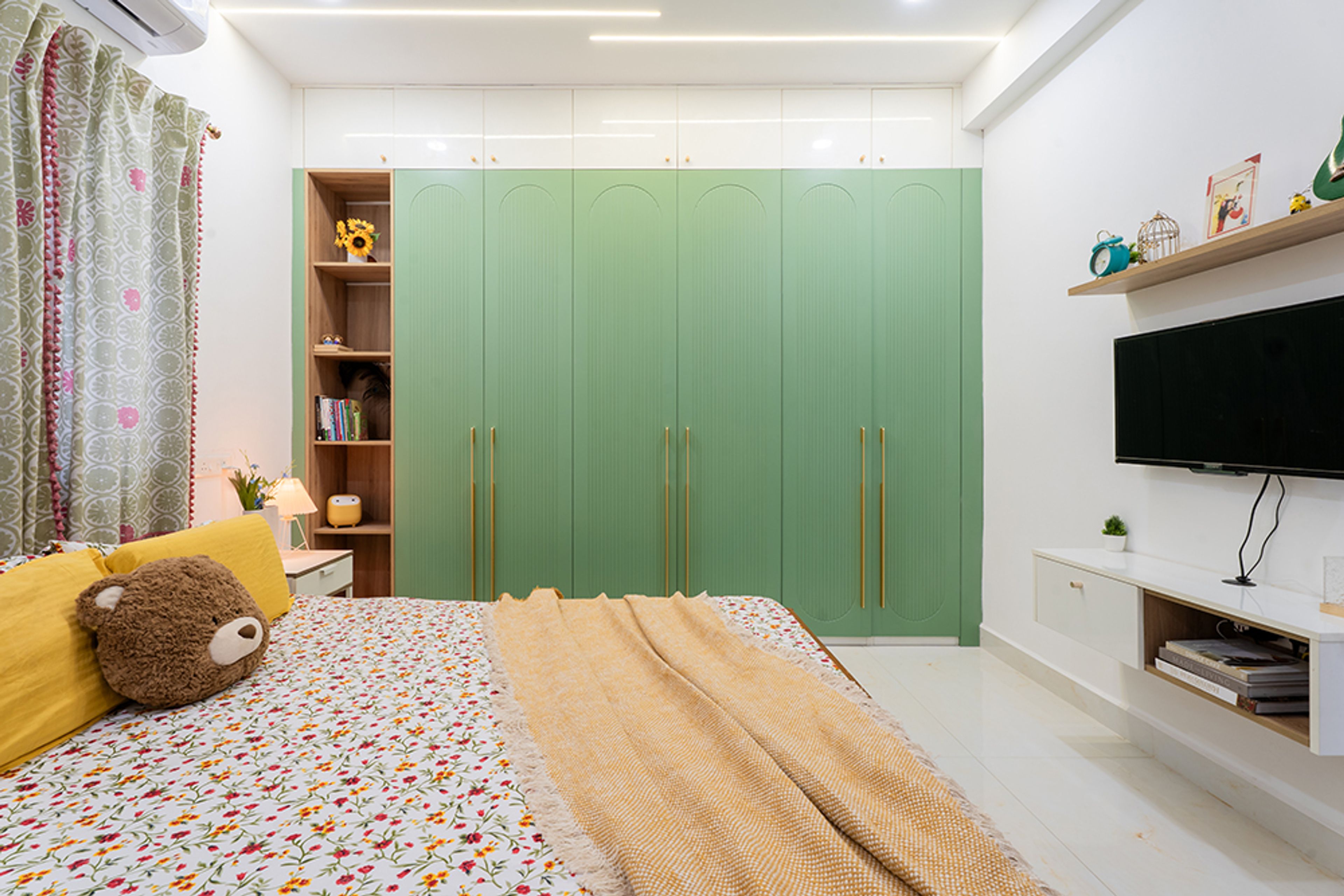 Bedroom Design with 6-Door Green Swing Wardrobe and Corner Storage