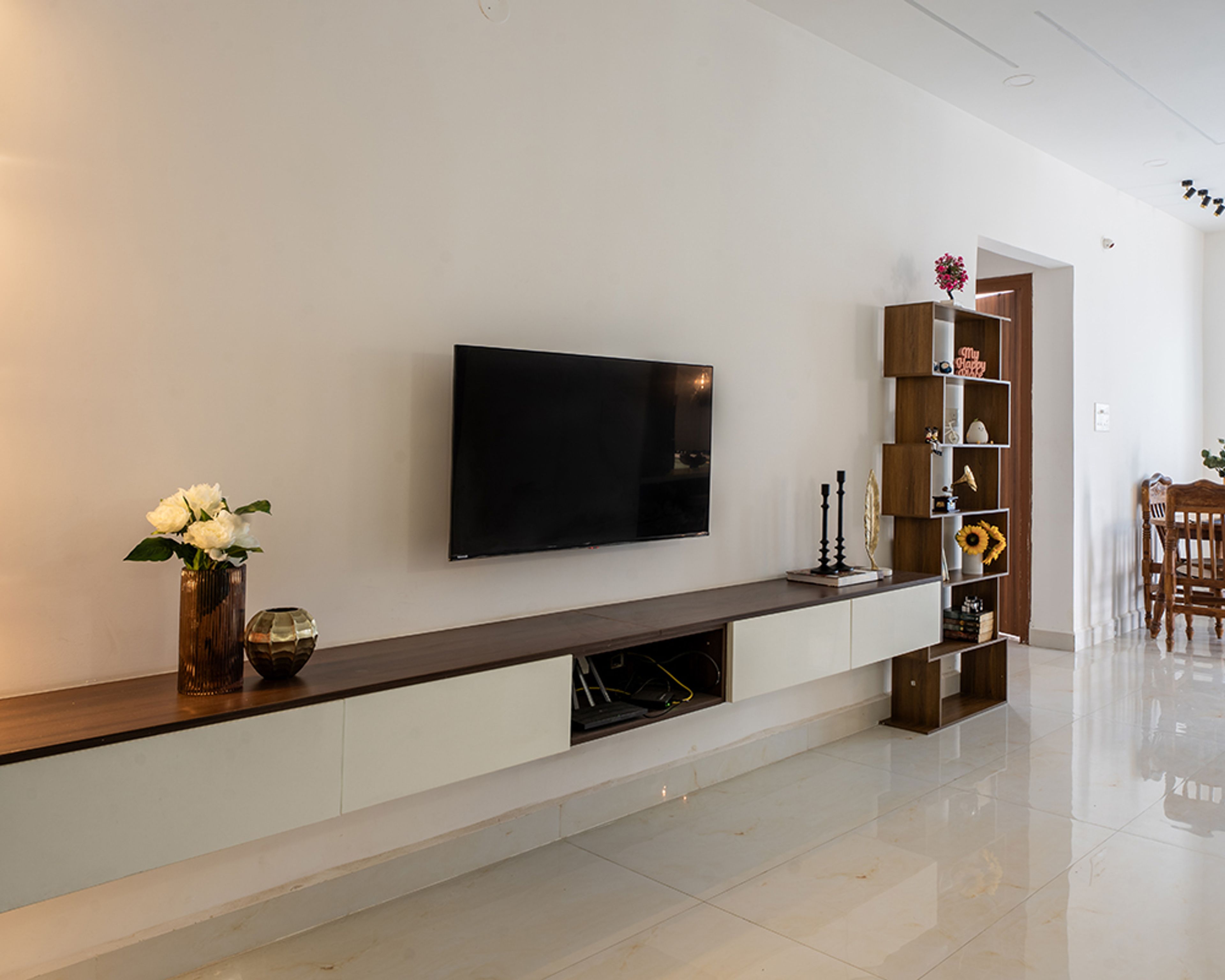 Living Room Design with Floating TV Unit and Open Display Shelf