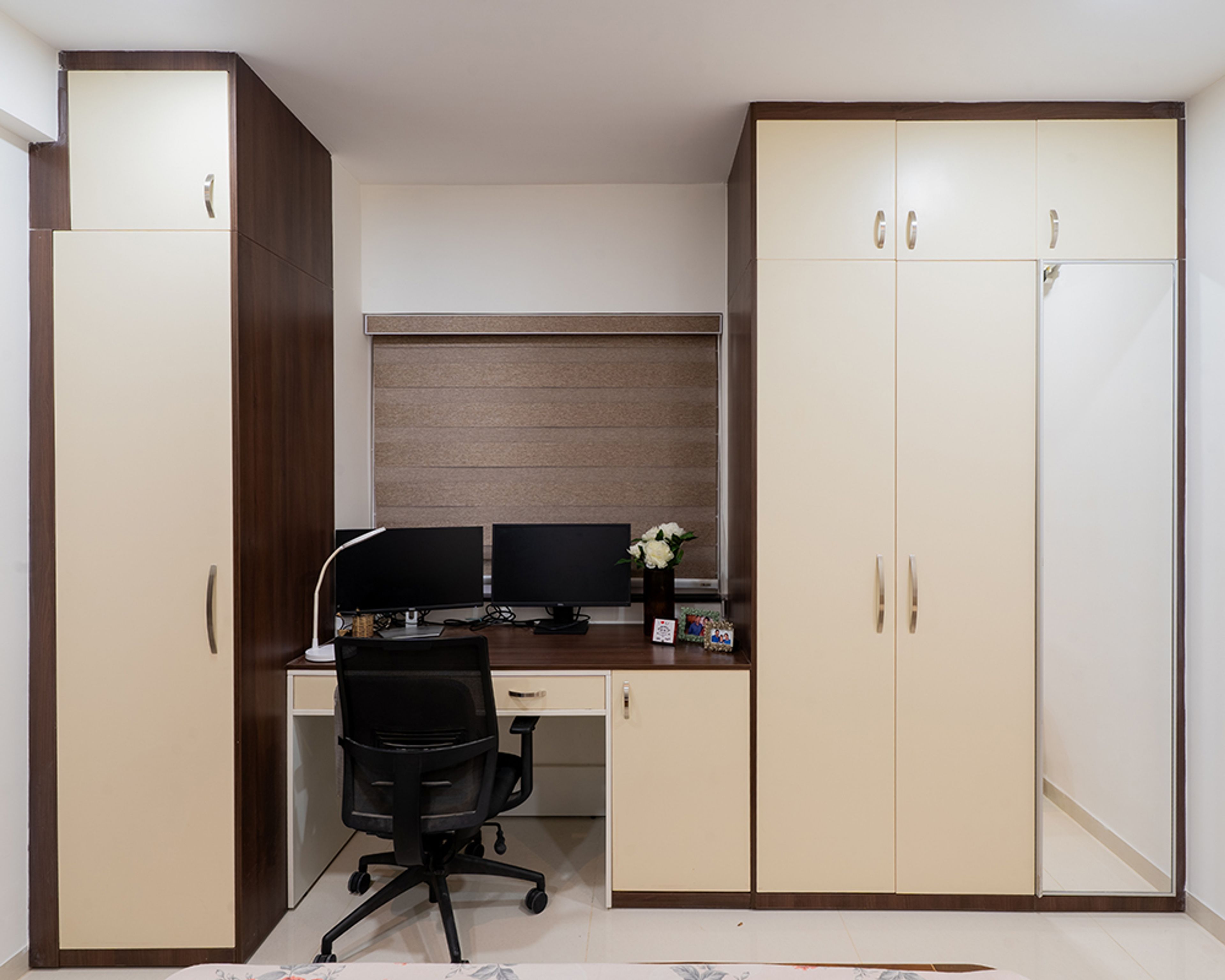 Study Unit Design with One Single Door and One 3-Door Wardrobe and Two Monitors