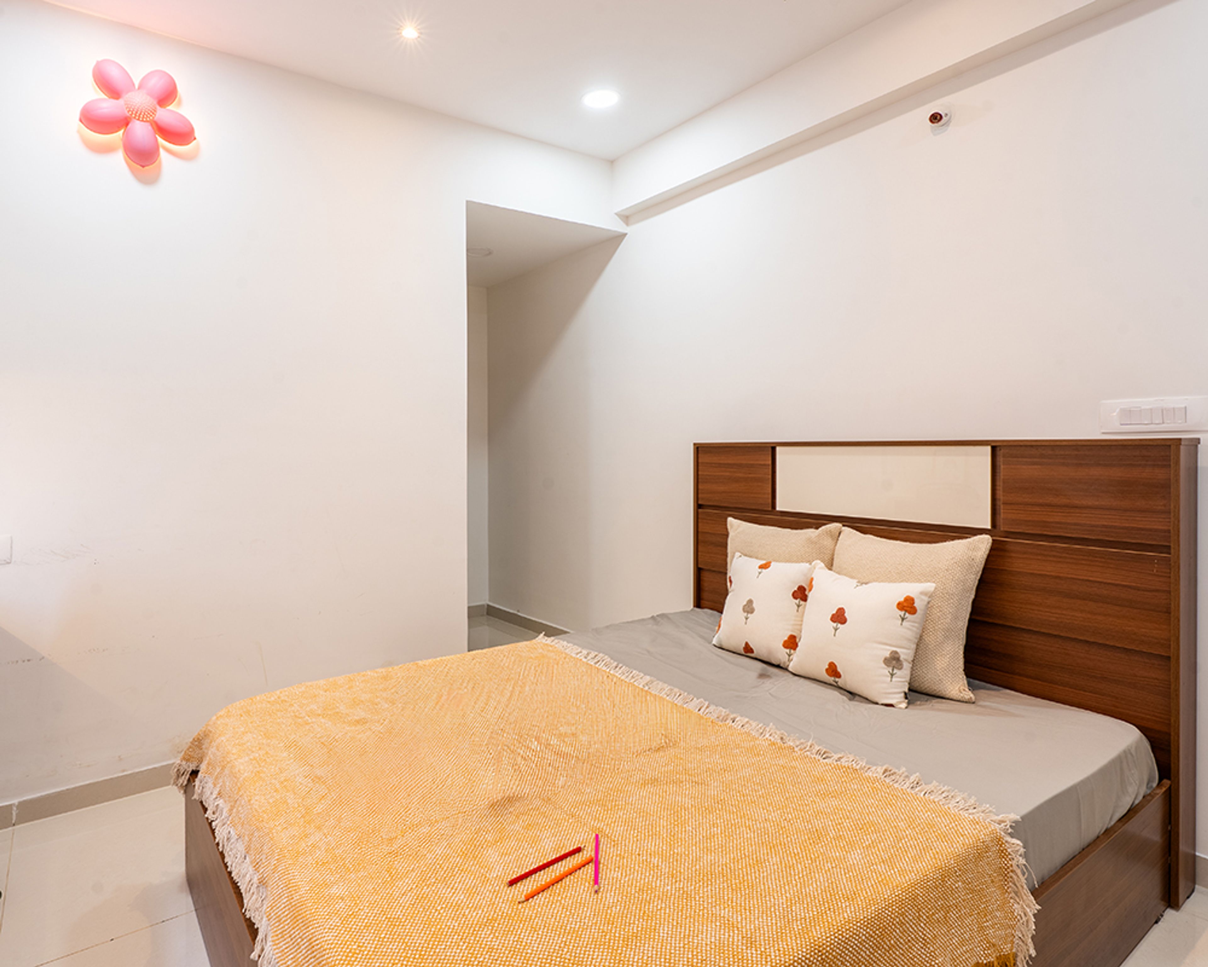 Kids Bedroom Design with Brown Bed and Pink Flower Wall Decor Light