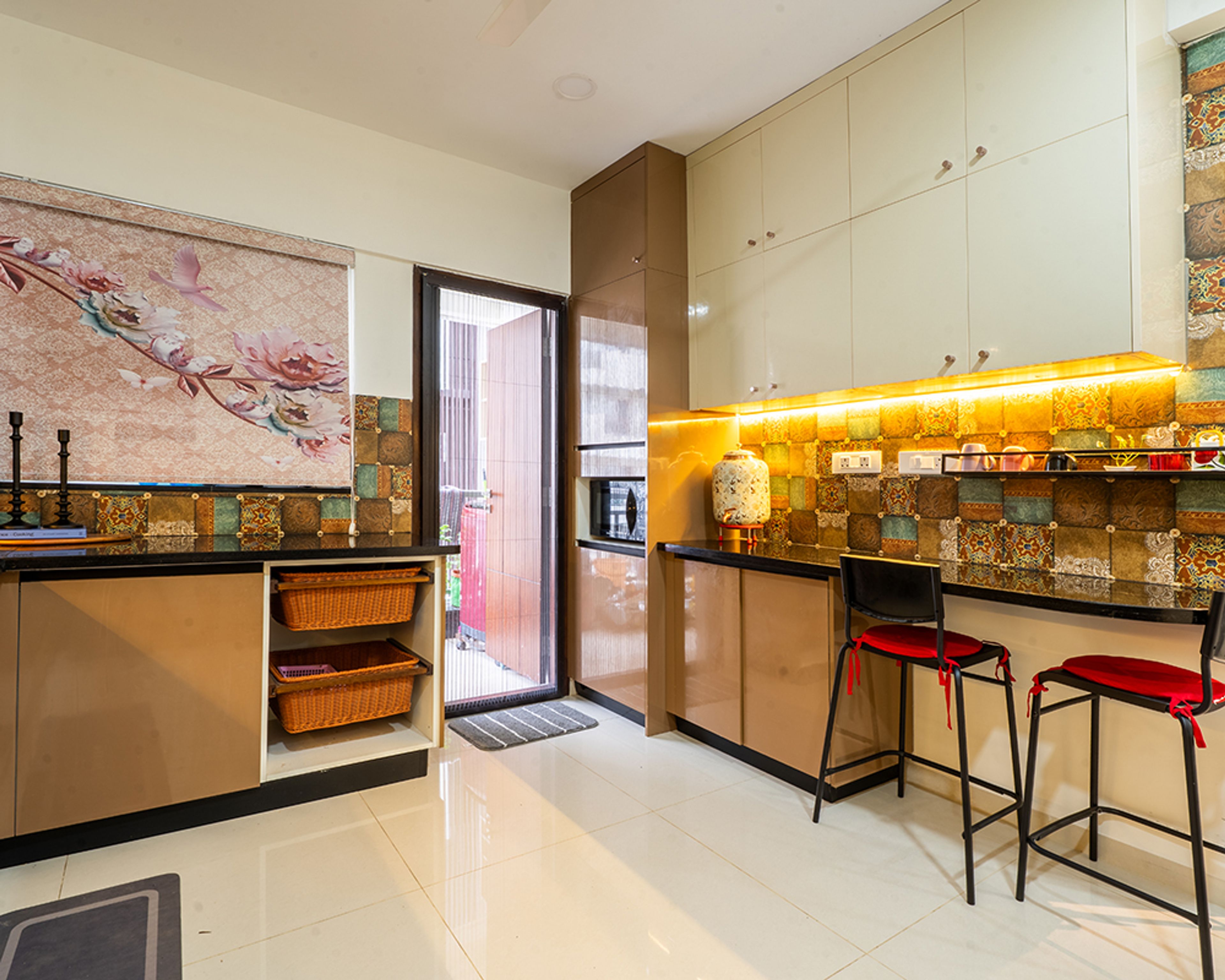 L-Shaped Kitchen Design with Brown and Cream Cabinets and Breakfast Counter