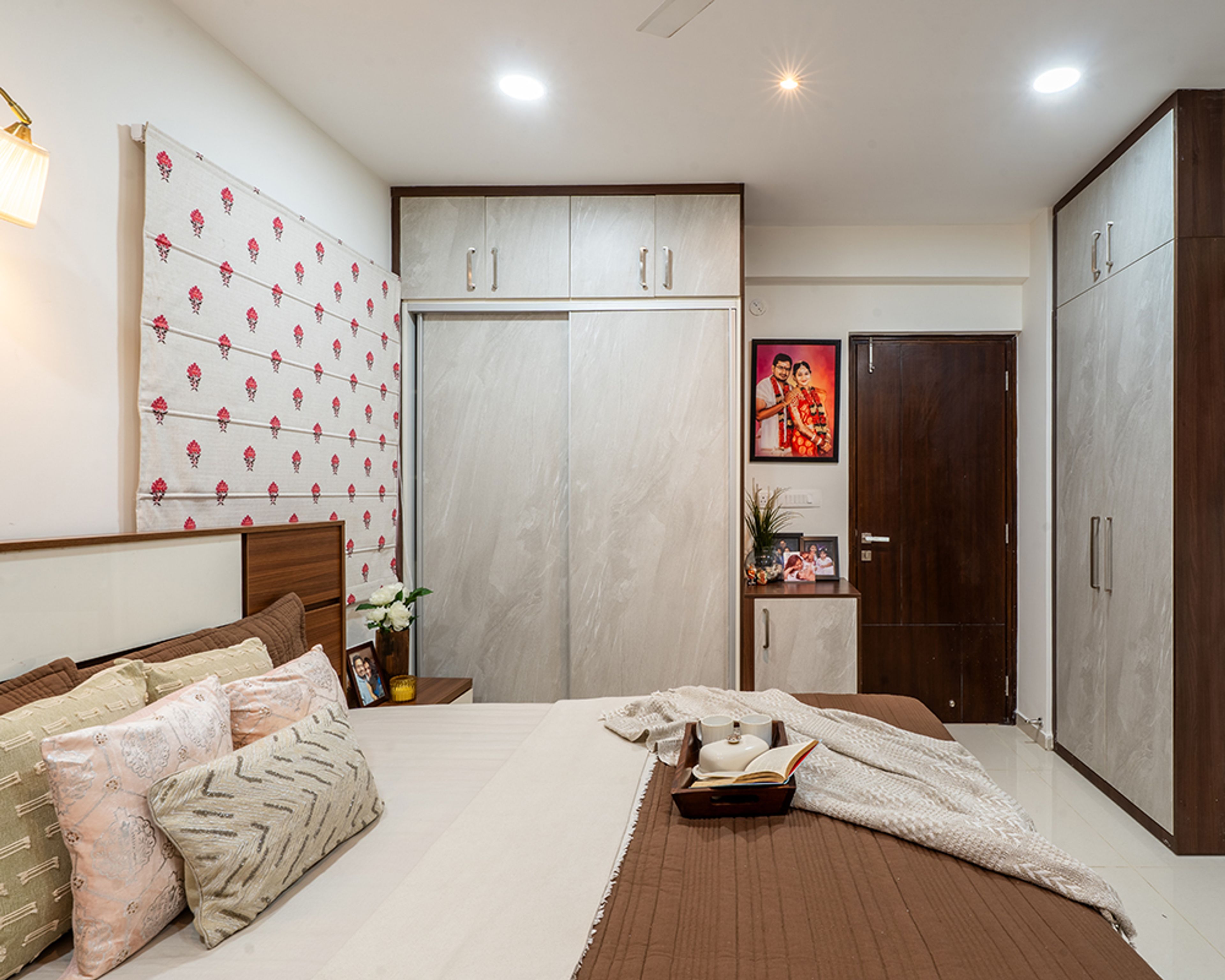 Bedroom Design with Brown Bed and Two Marble Patterned 2-Door Wardrobes