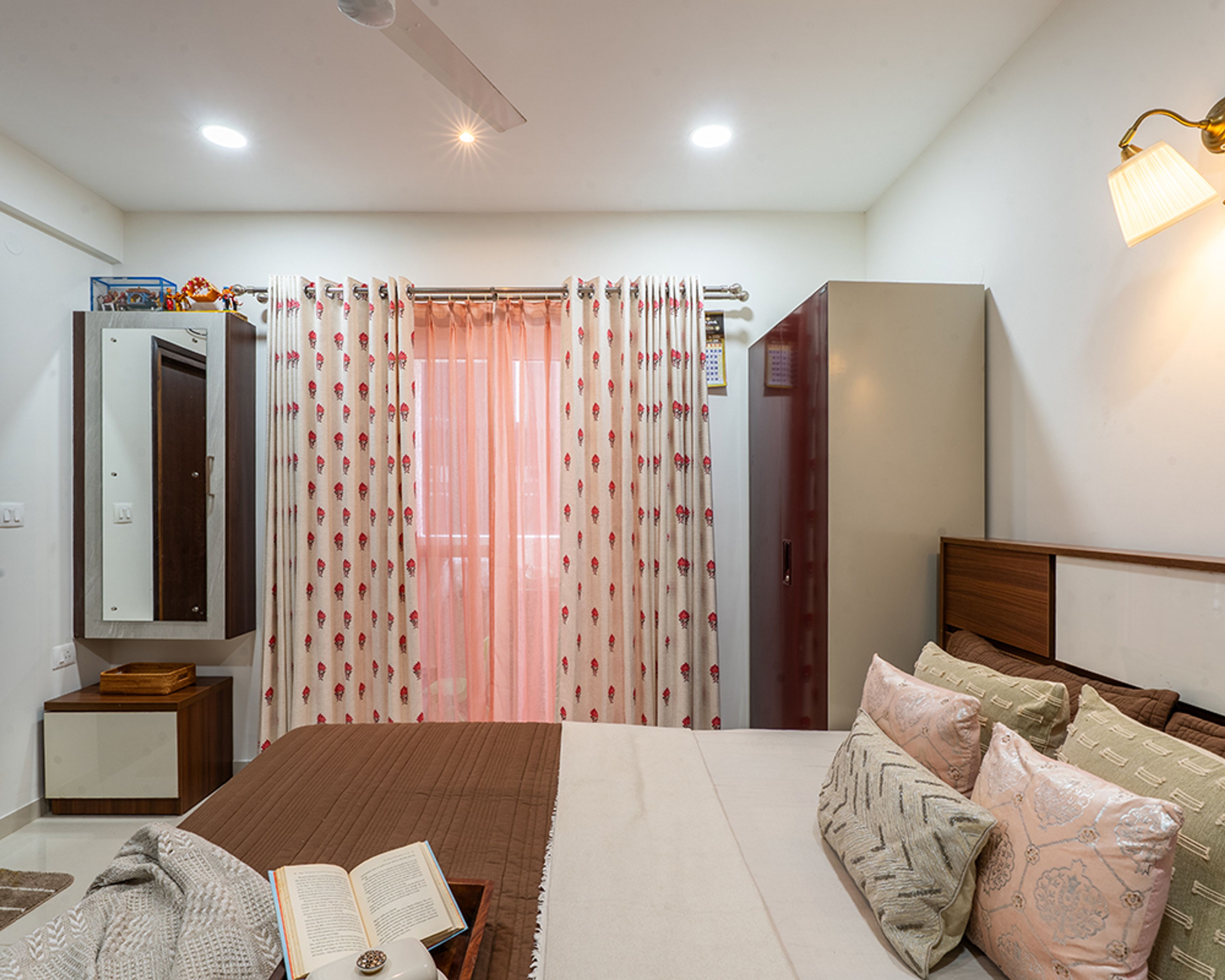 Bedroom Design with Brown Bed and Wall Mounted Dressing Unit