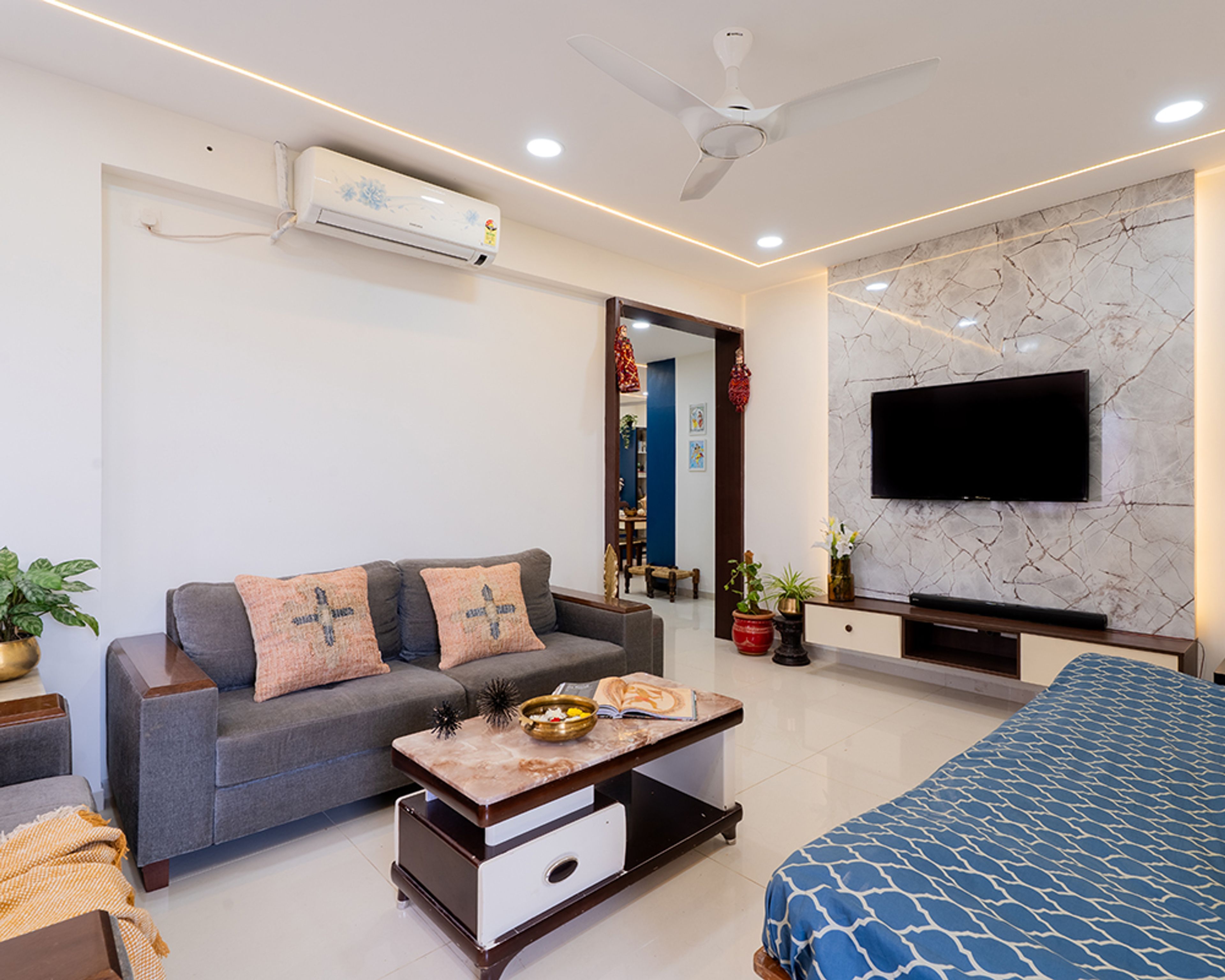 Living Room Design with Grey Sofa and Marble TV Wall Panel