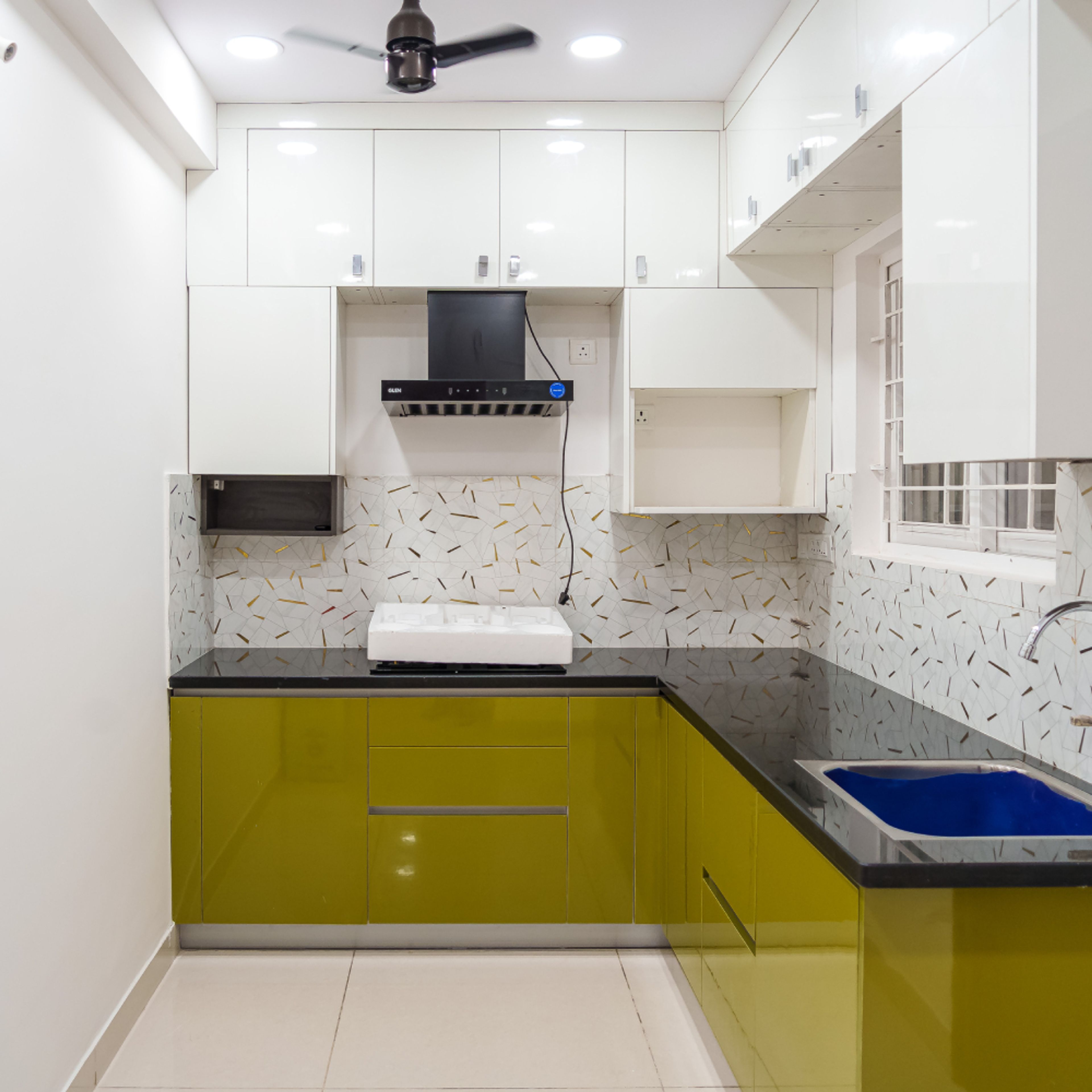 L-Shaped Design With Lime Cabinets and Granite Counter
