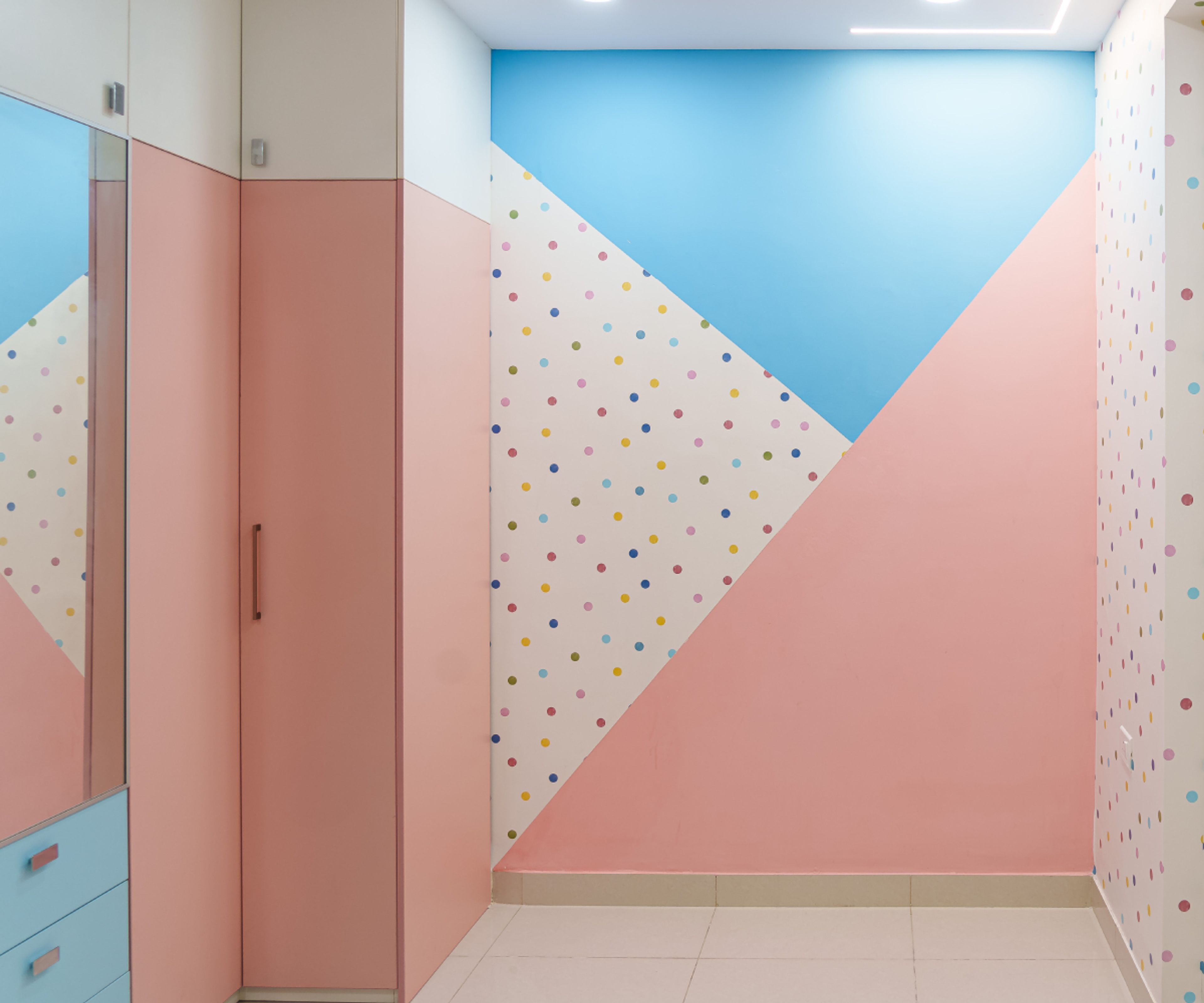 Pastel-Themed Kids Bedroom Design with 3-Door Swing Wardrobe and Attacged Mirror