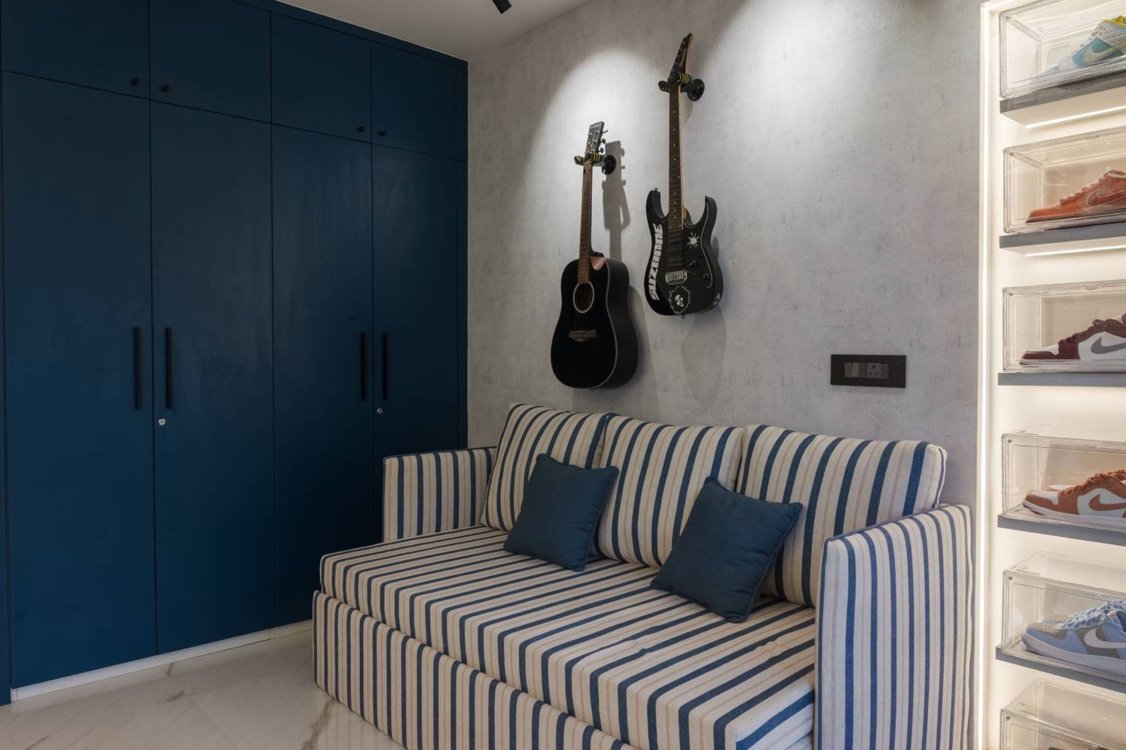 Space Saving Wardrobe Design with Blue Contrast and Grey Texture