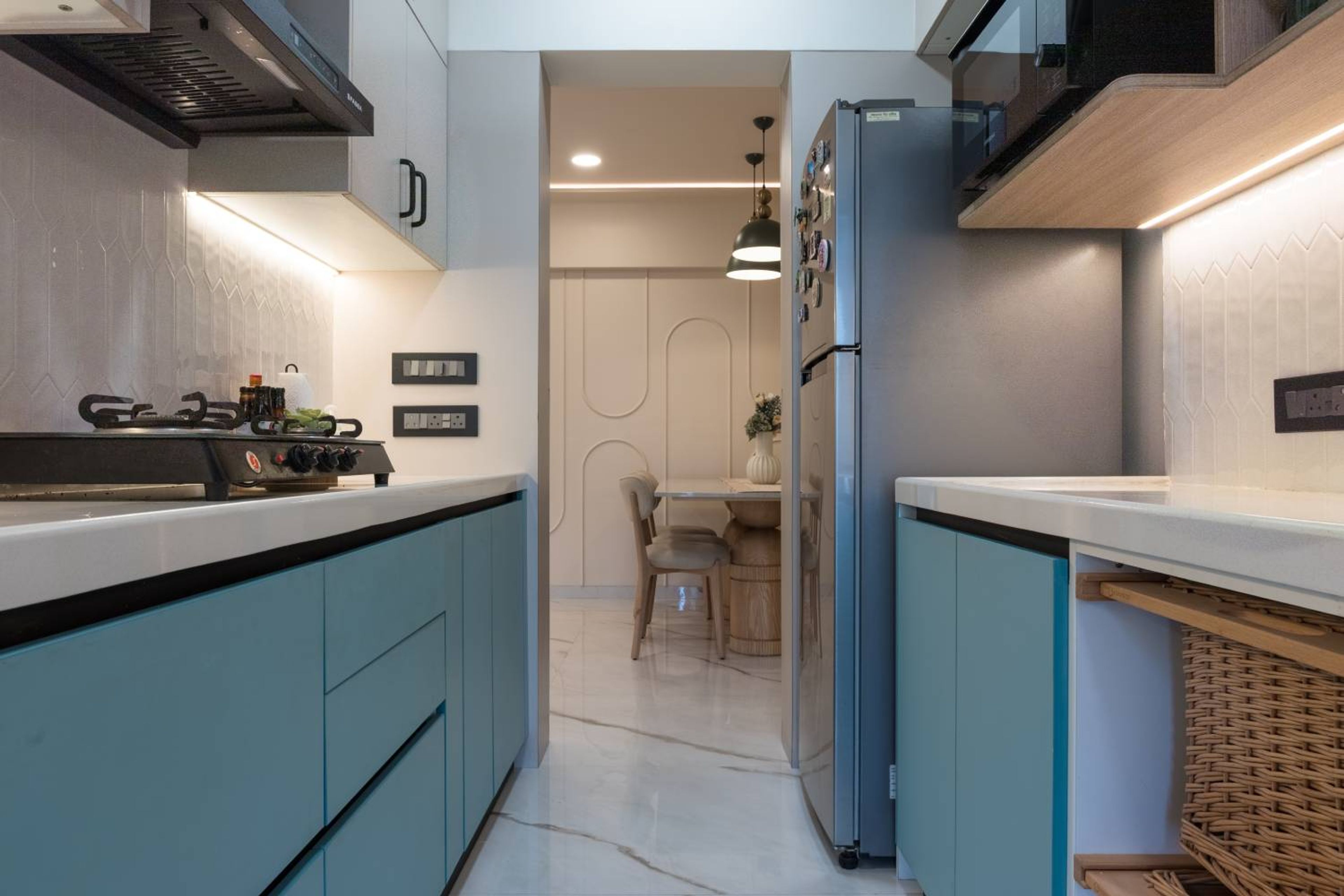 Parallel Kitchen Design in Blue and White with Grid Glass Doors
