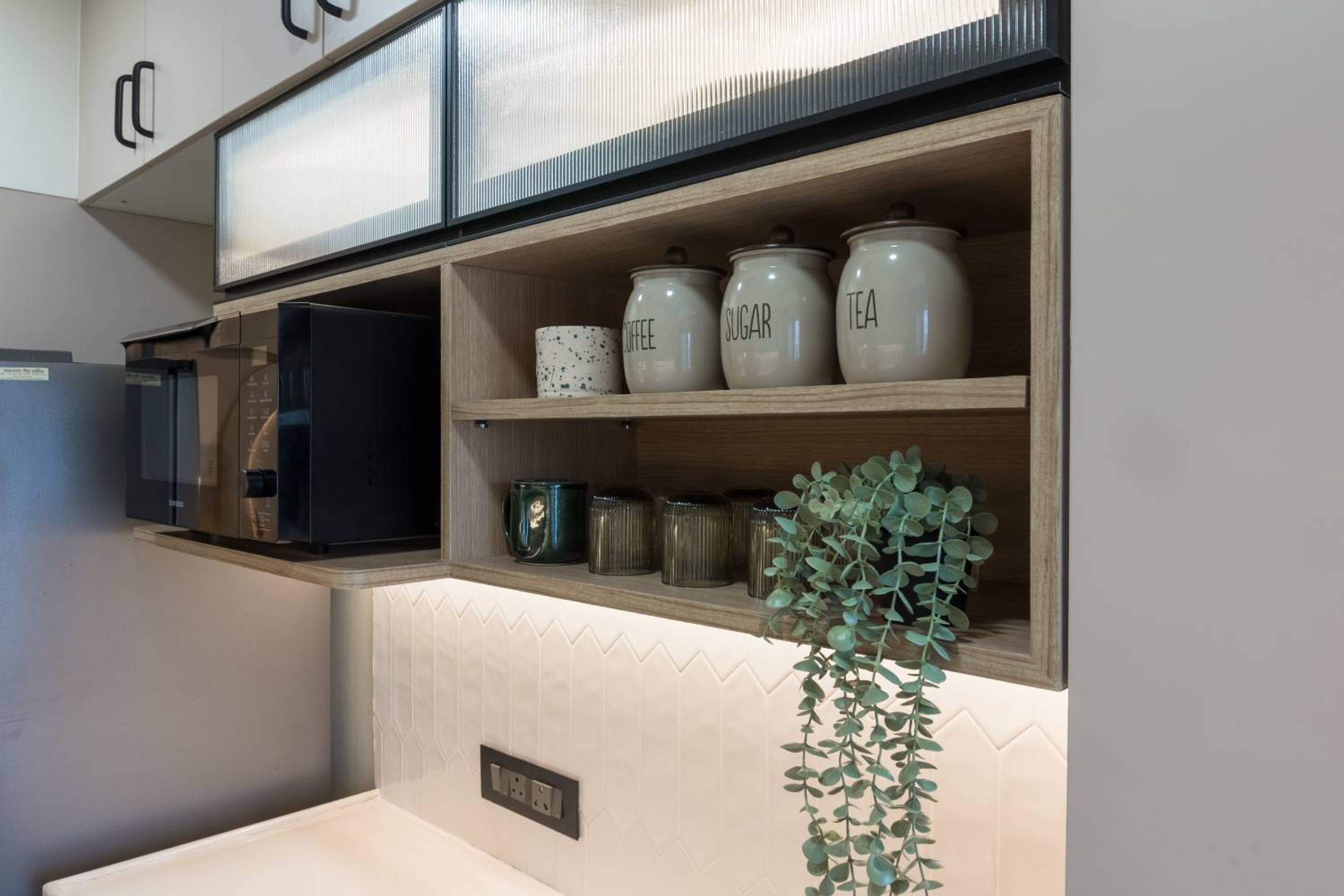 Parallel Kitchen Design in Blue and White with Grid Glass Doors