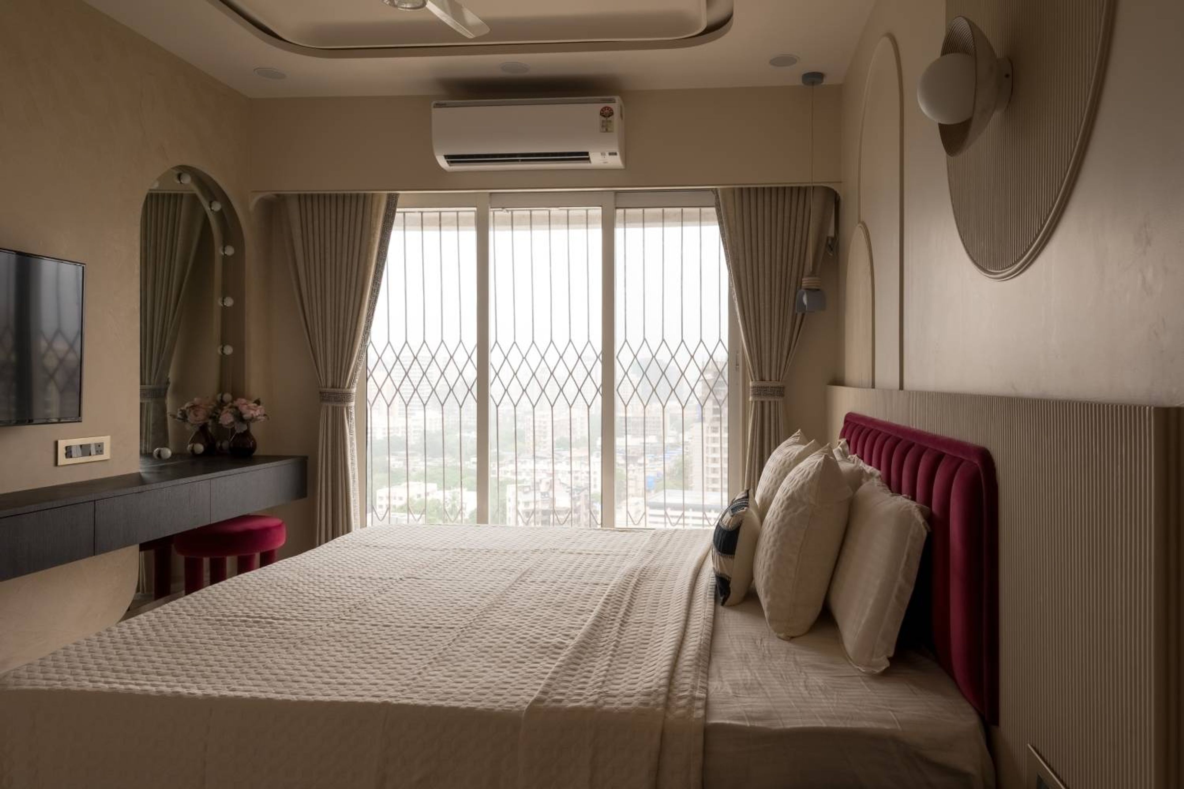 Bedroom Design with Wooden TV Unit and Beige Fluted Headboard Wall