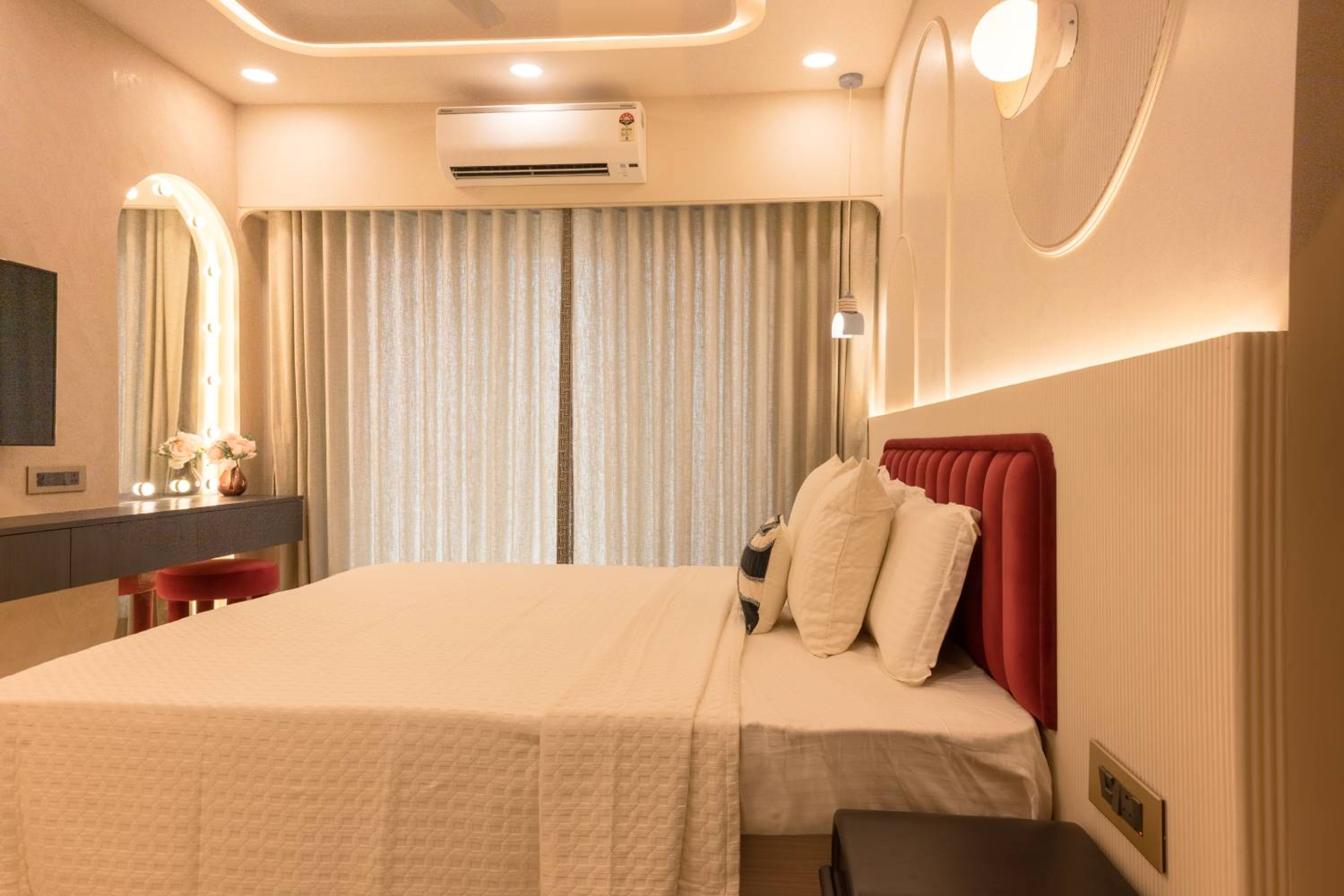 Bedroom Design with Wooden TV Unit and Beige Fluted Headboard Wall