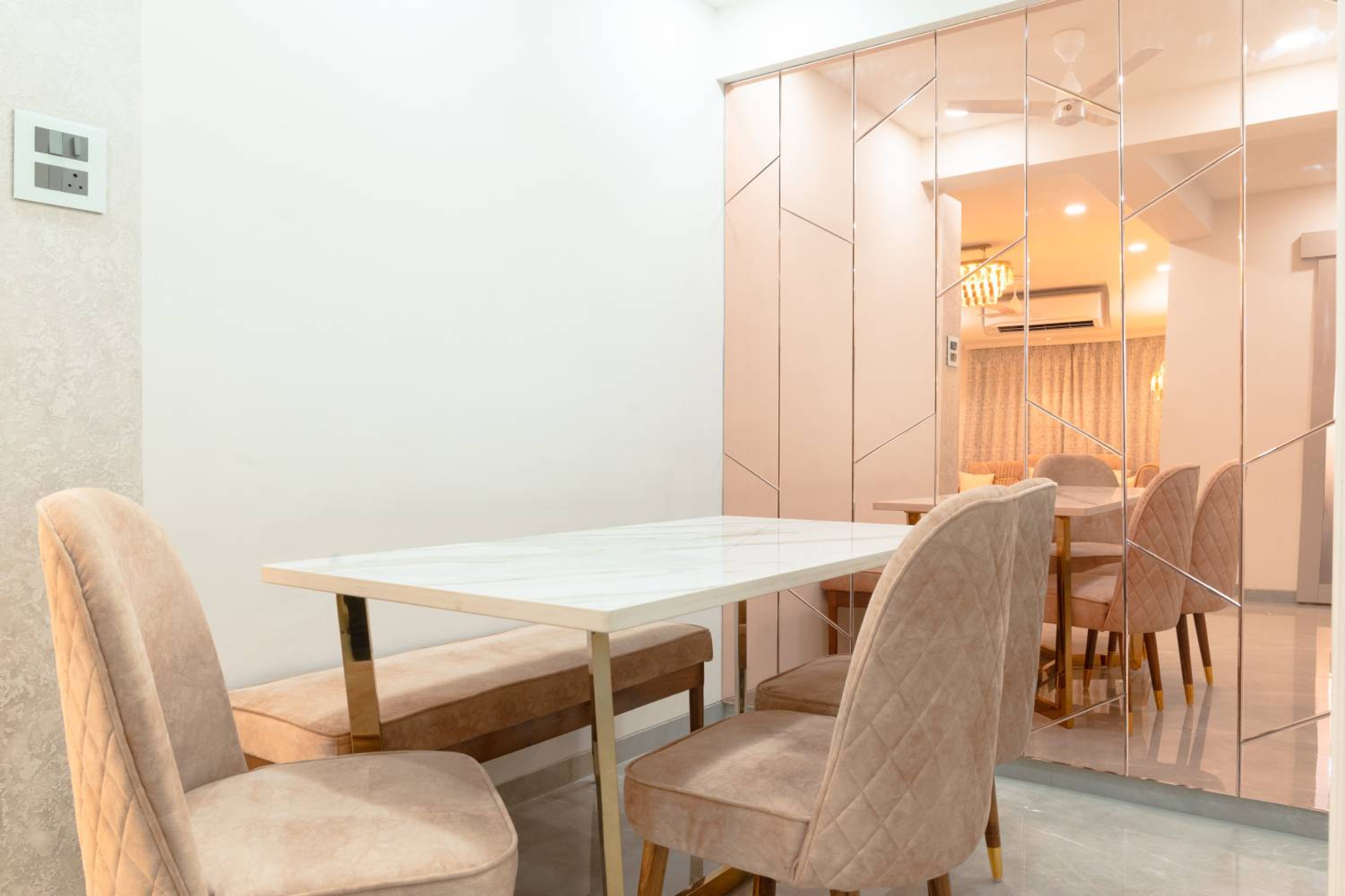Modern Dining Room Design with Marble Table and Pastel Seating