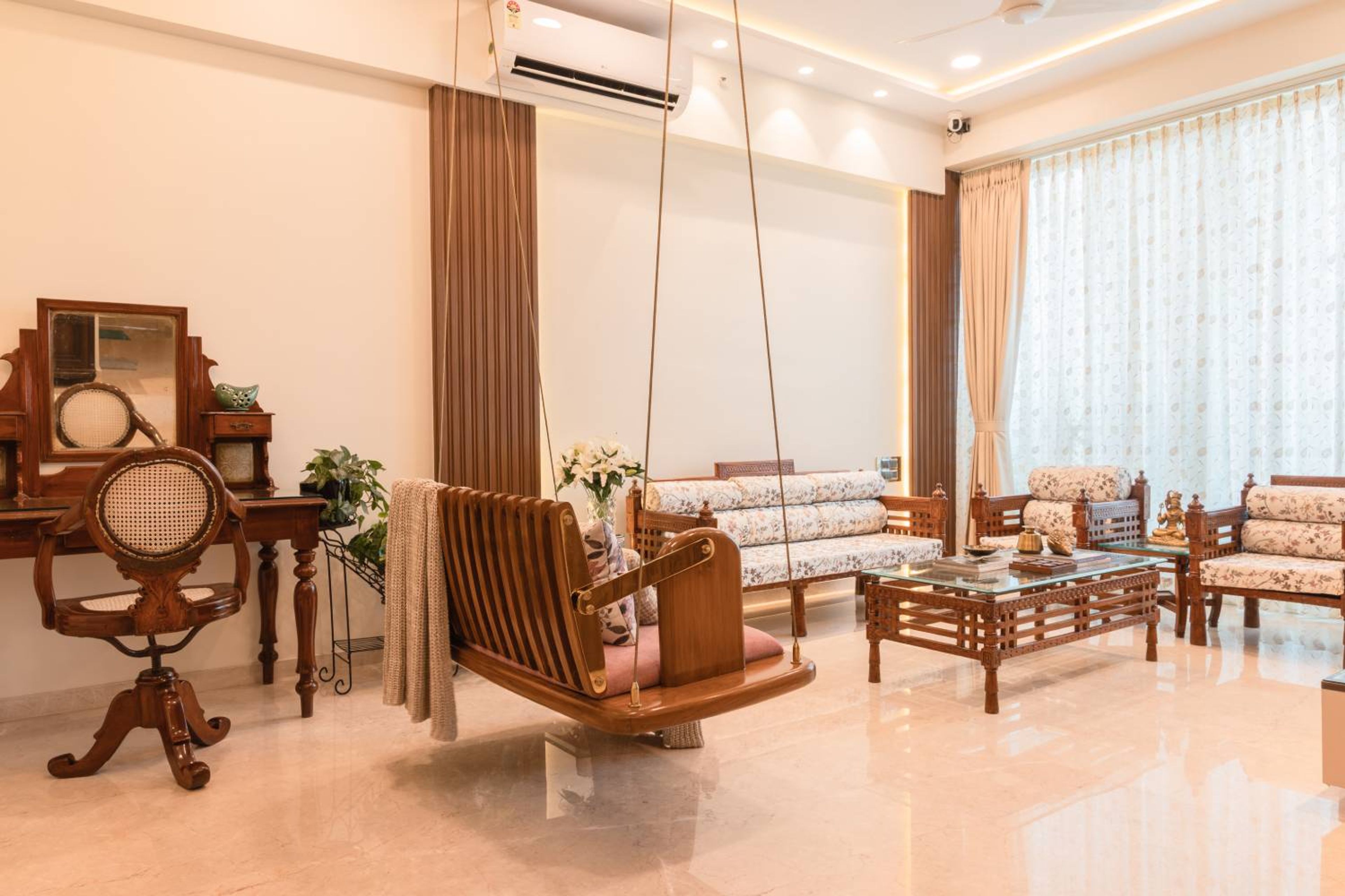 Living Room Design with Wooden Swing and Wooden Vanity with Chair