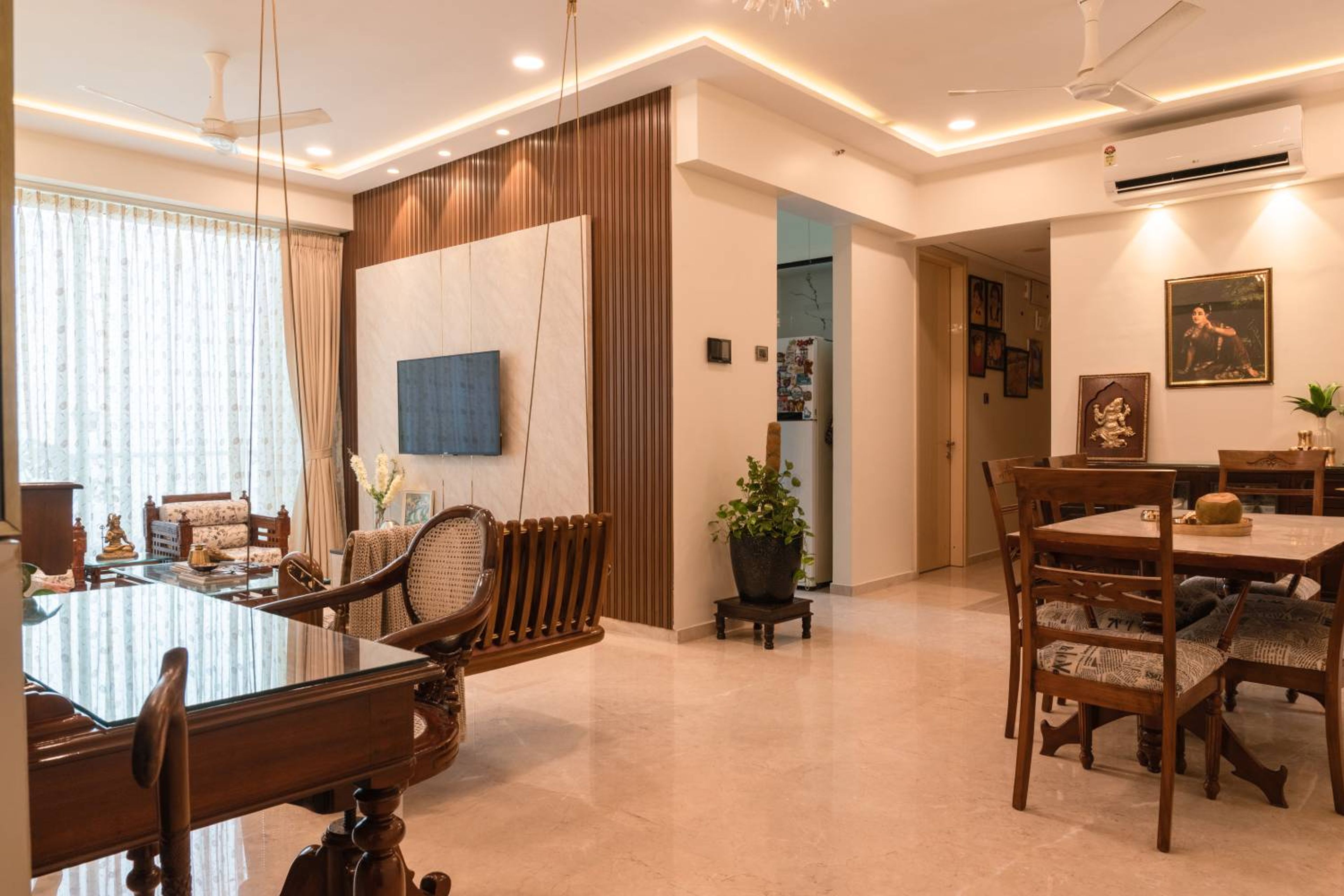 Dining-Cum-Living Room Design with Wooden Swing and Dining Table