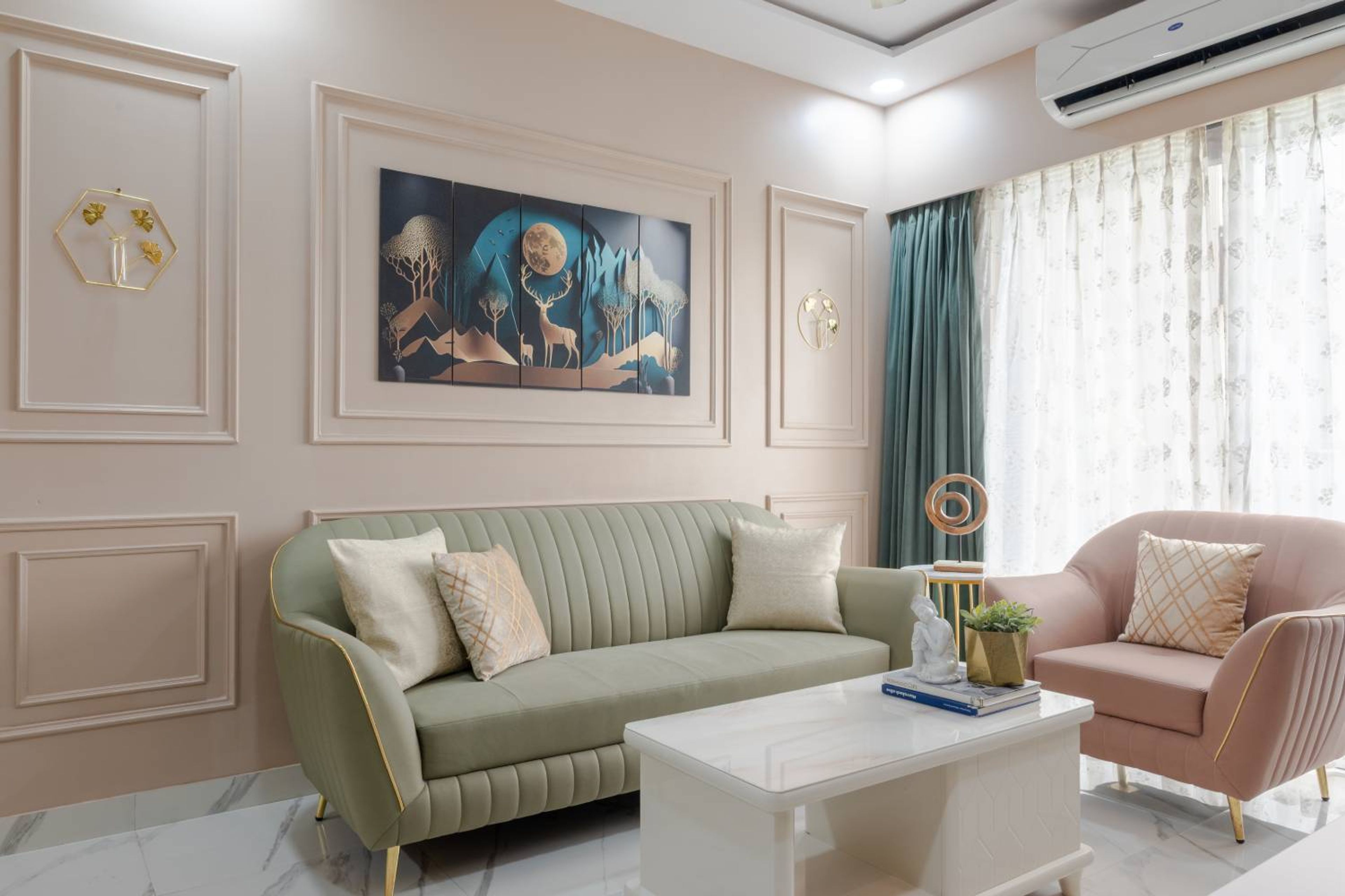 Living Room Design with 3-Seater Green and Single Pink Sofa and Cream Wall with Trims