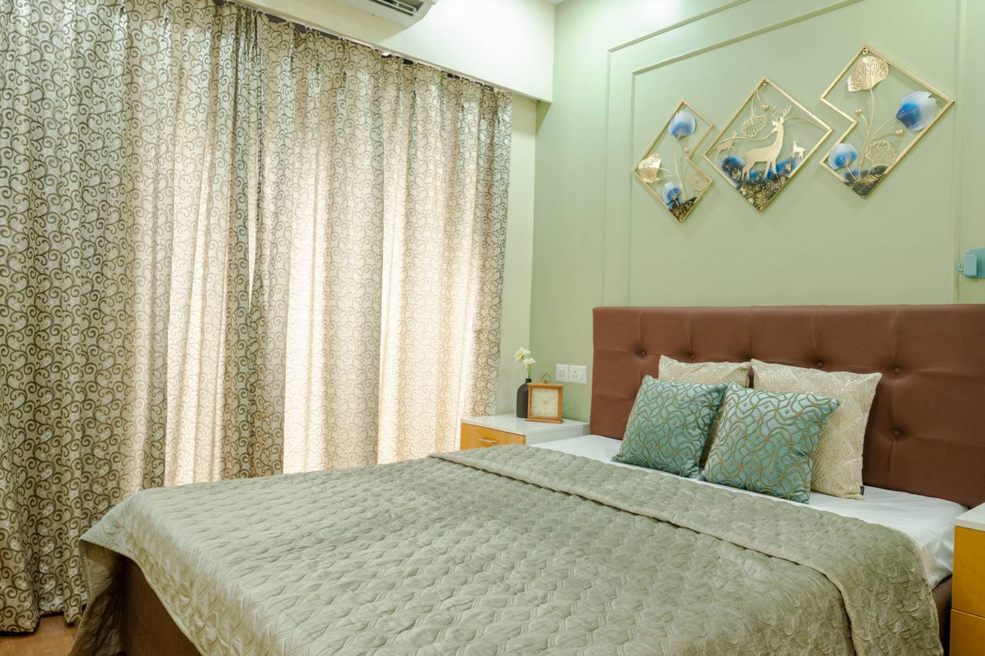 Bedroom Design with Green Walls and Brown Leather Headboard Bed