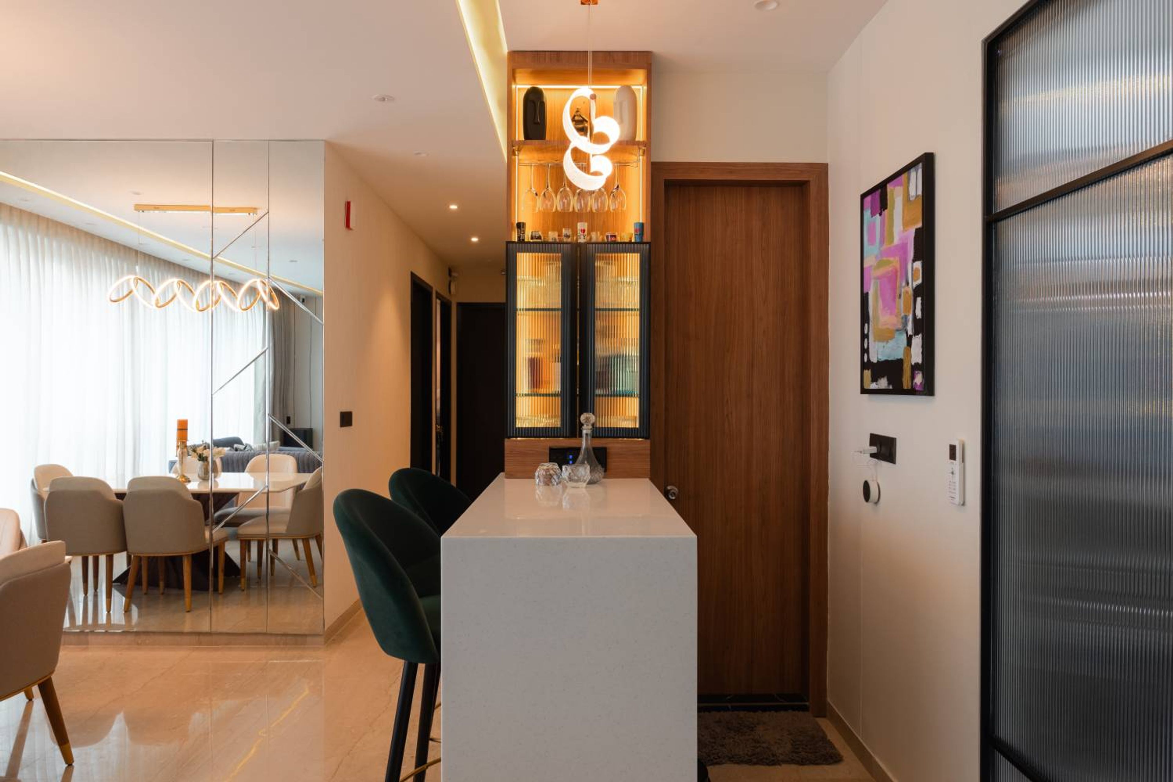 Home bar unit with green chairs