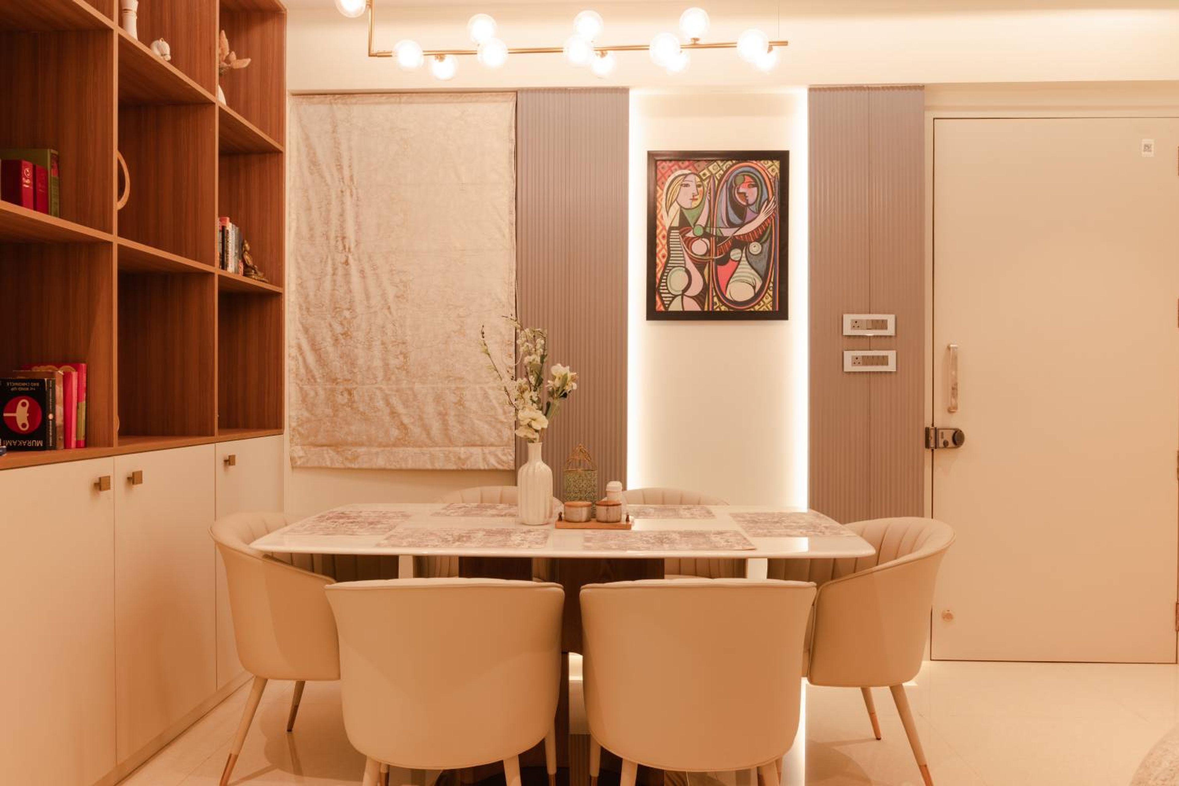 6-Seater Dining Room Design with Cushioned Chairs and Marble Top Table