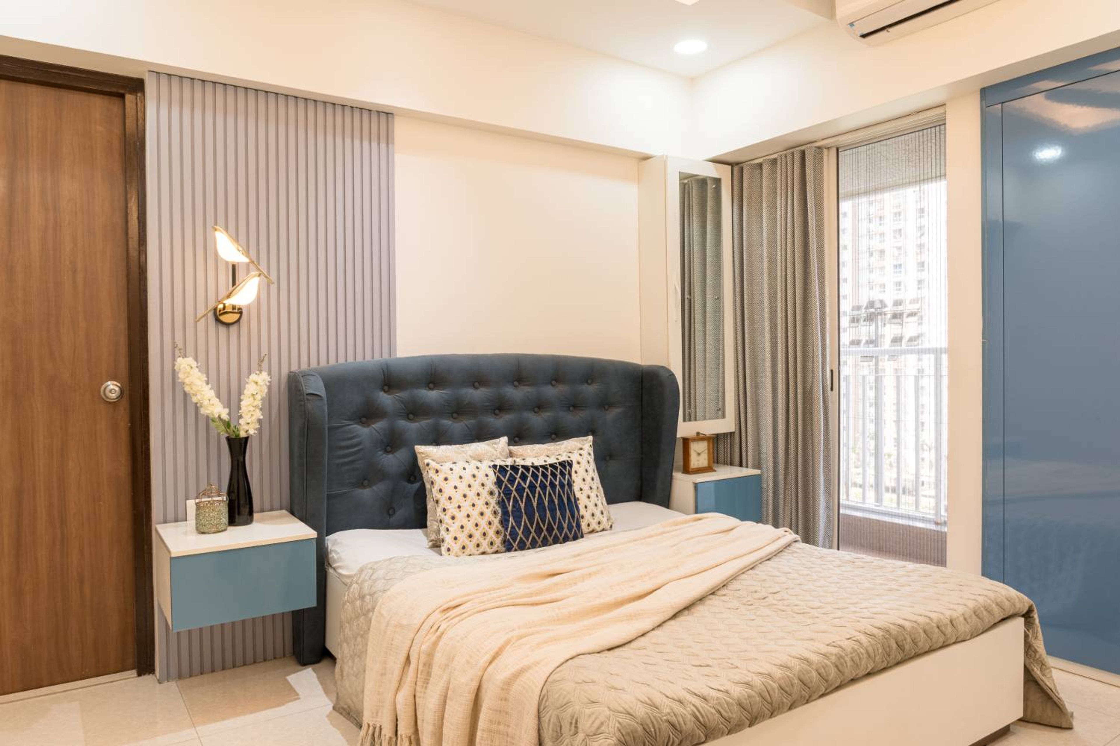 Master Bedroom Design with Blue Headboard Bed, Grey wall Slats and White Dressing Unit