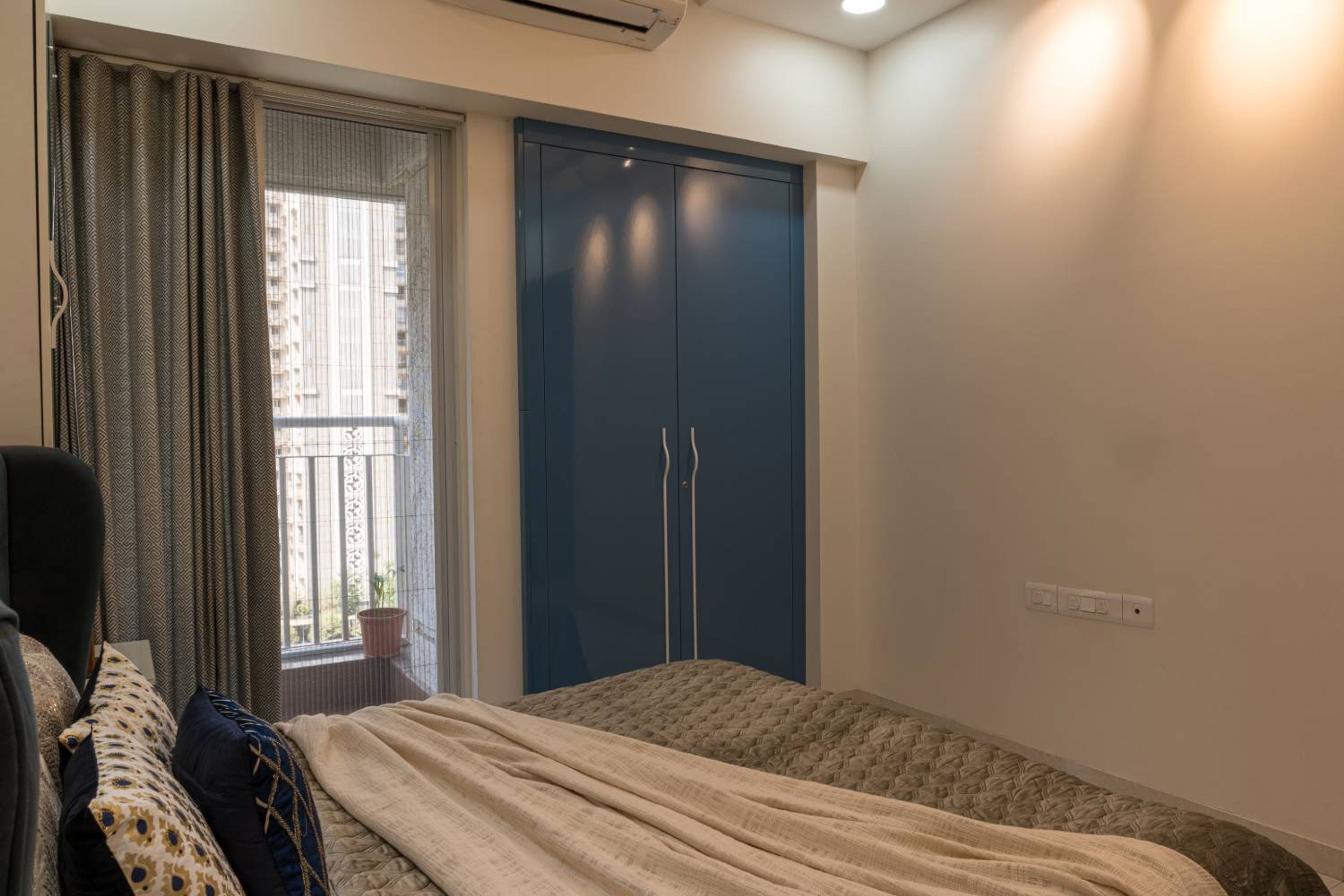 Bedroom Design with 2-Door Navy Blue Swing wardrobe